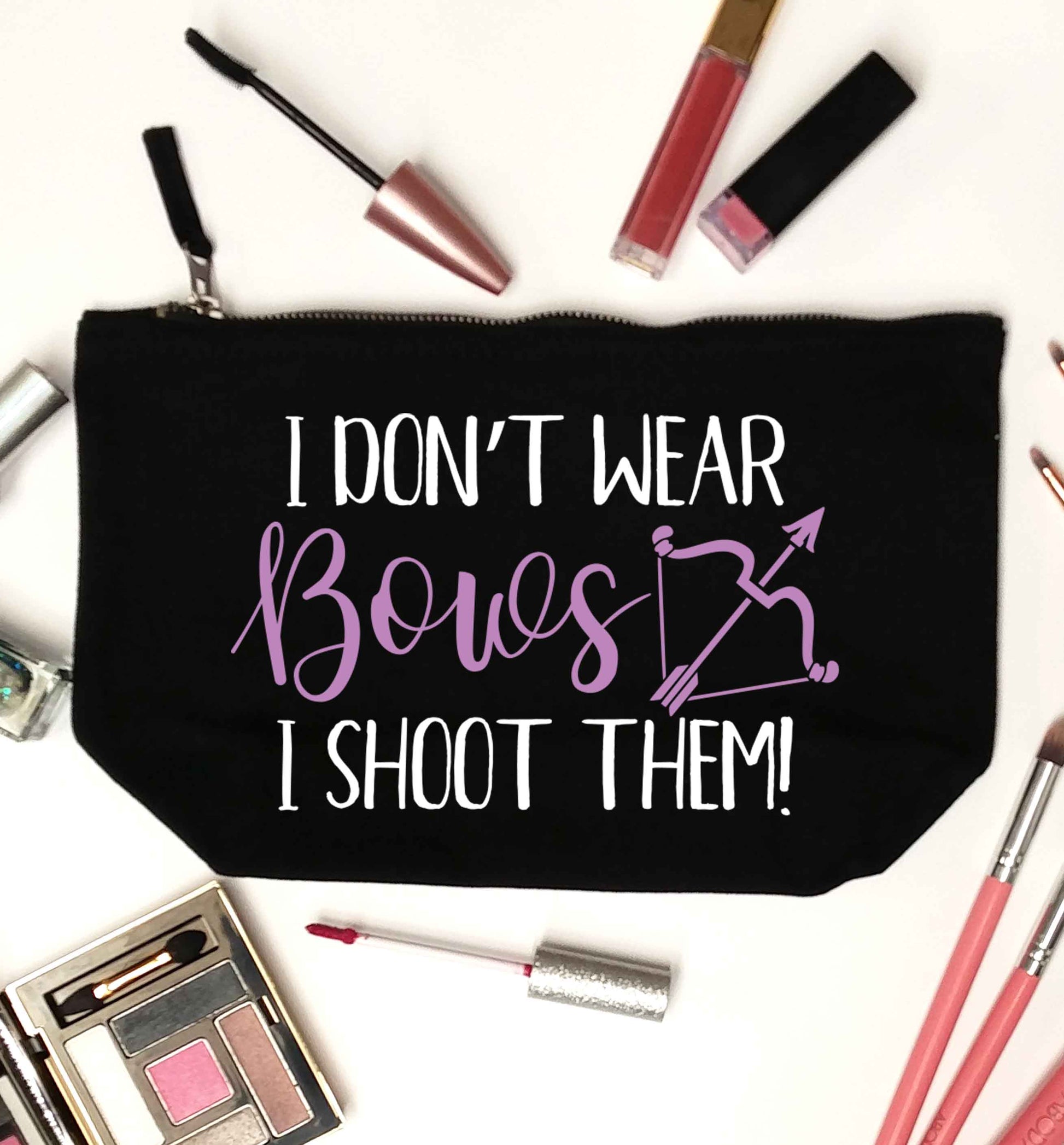 I don't wear bows I shoot them black makeup bag