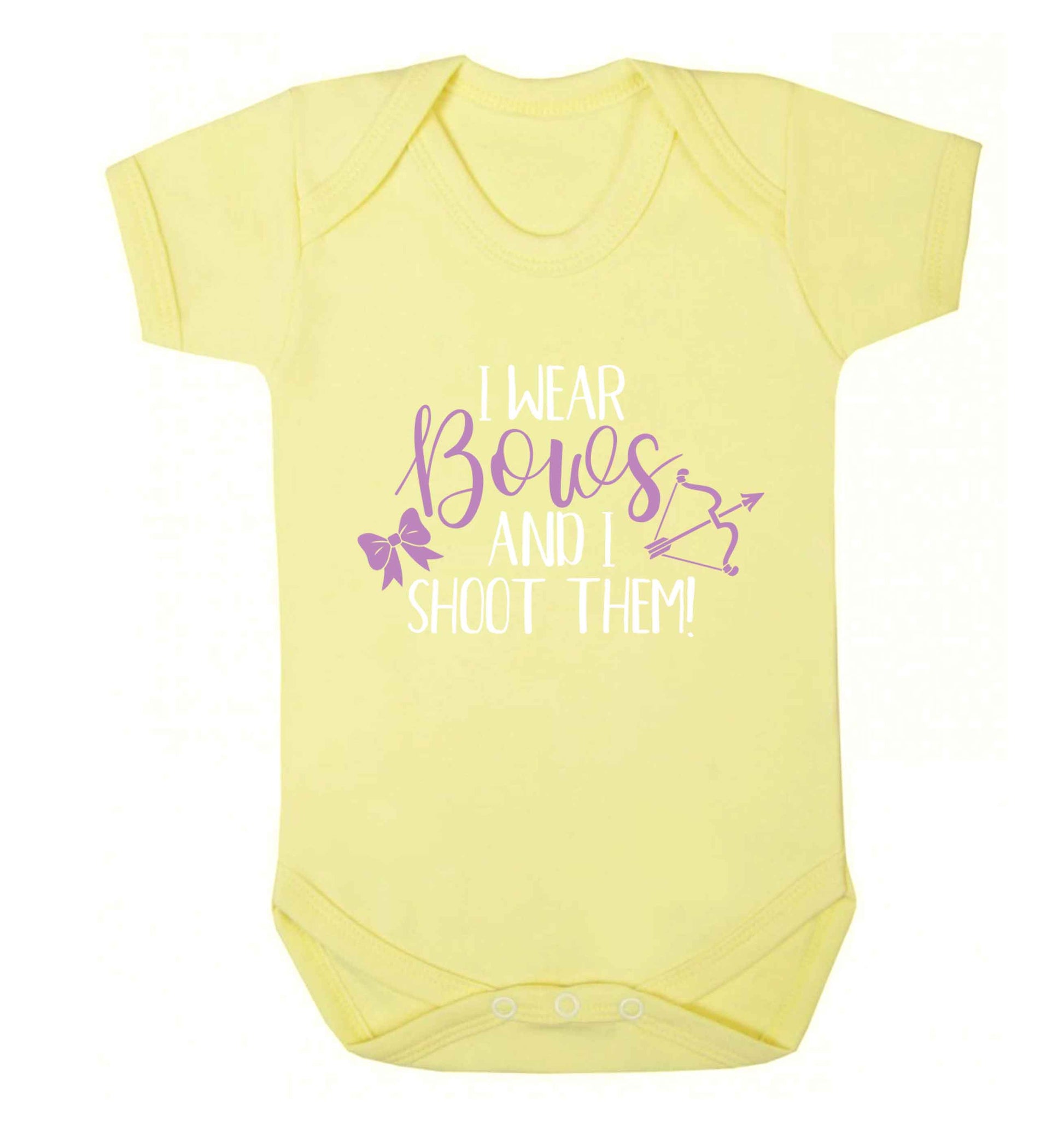 I wear bows and I shoot them Baby Vest pale yellow 18-24 months