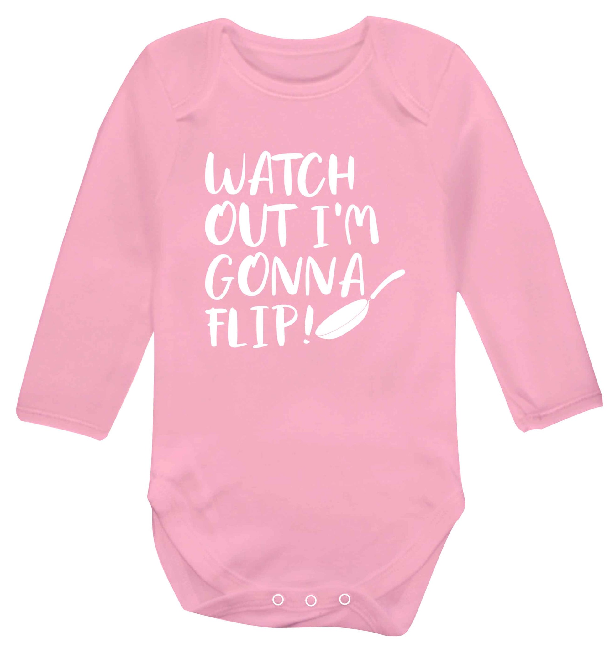 Watch out I'm gonna flip! baby vest long sleeved pale pink 6-12 months