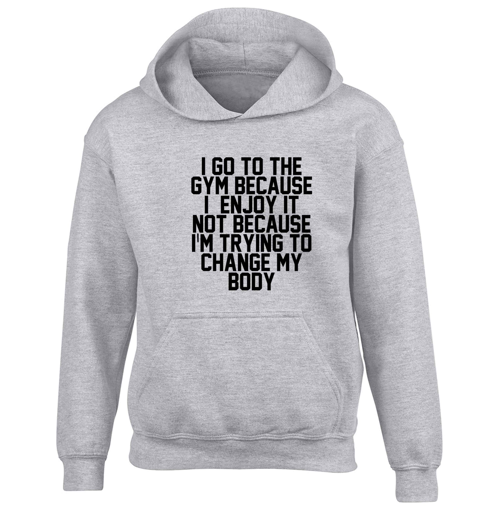 I go to the gym because I enjoy it not because I'm trying to change my body children's grey hoodie 12-13 Years