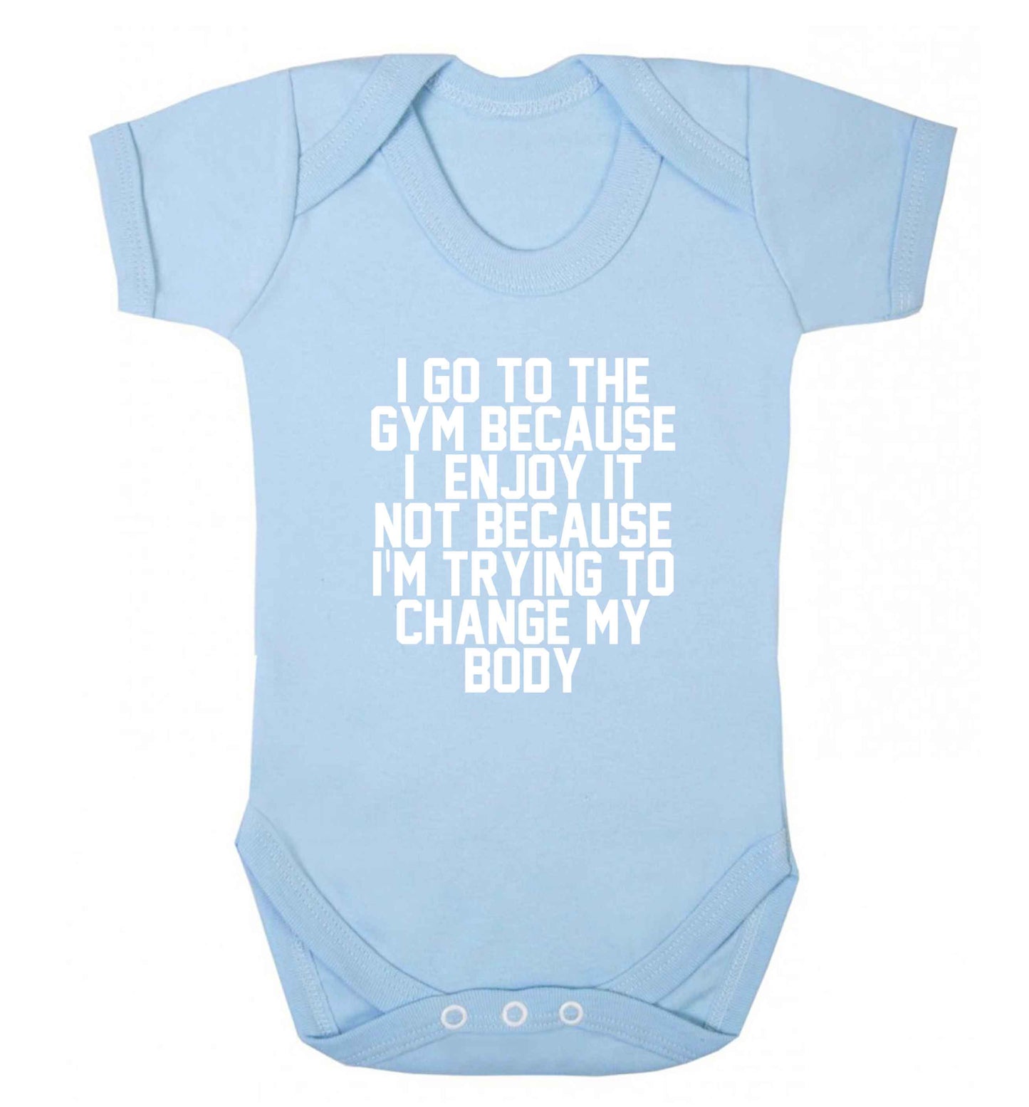 I go to the gym because I enjoy it not because I'm trying to change my body baby vest pale blue 18-24 months