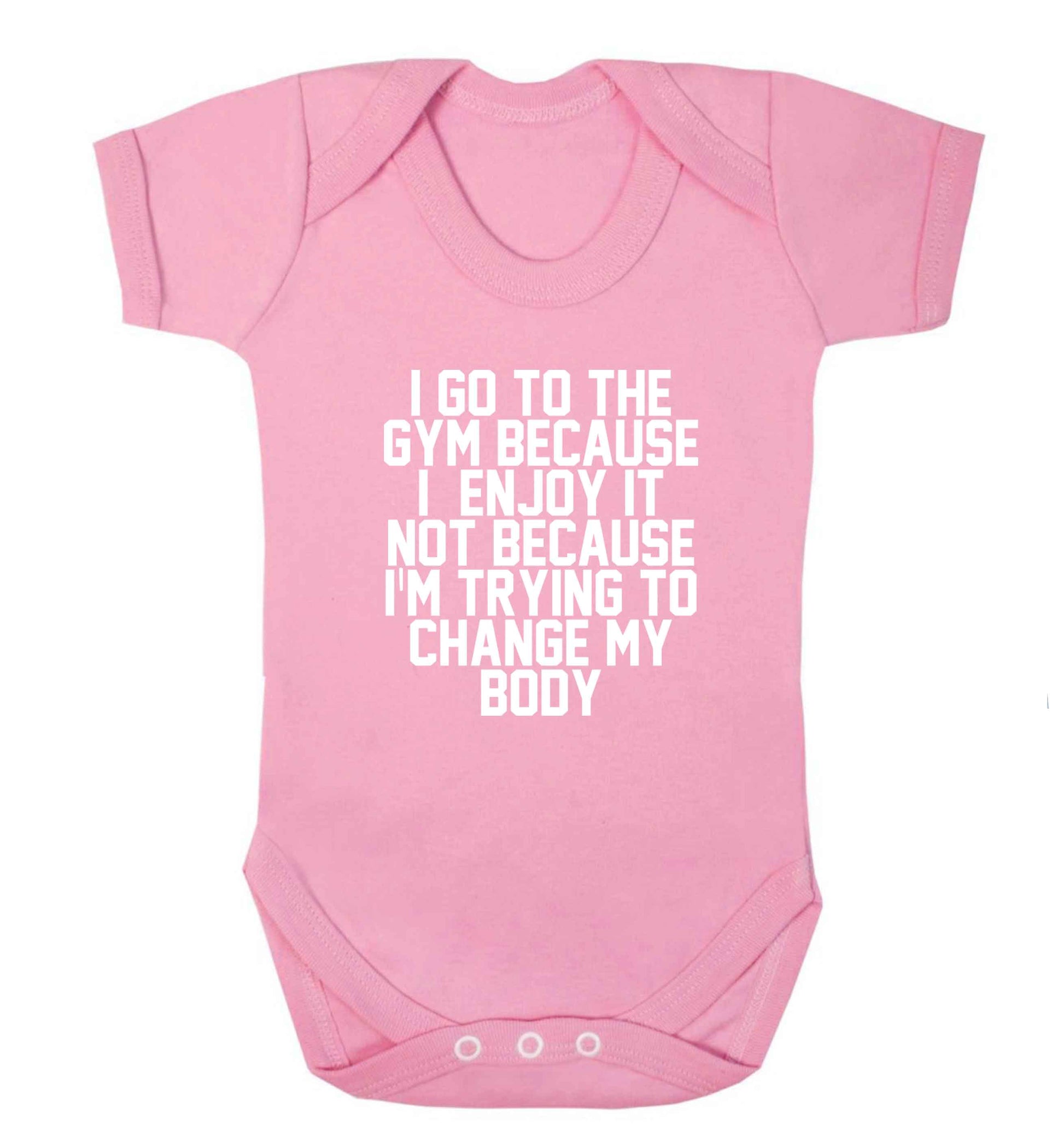 I go to the gym because I enjoy it not because I'm trying to change my body baby vest pale pink 18-24 months