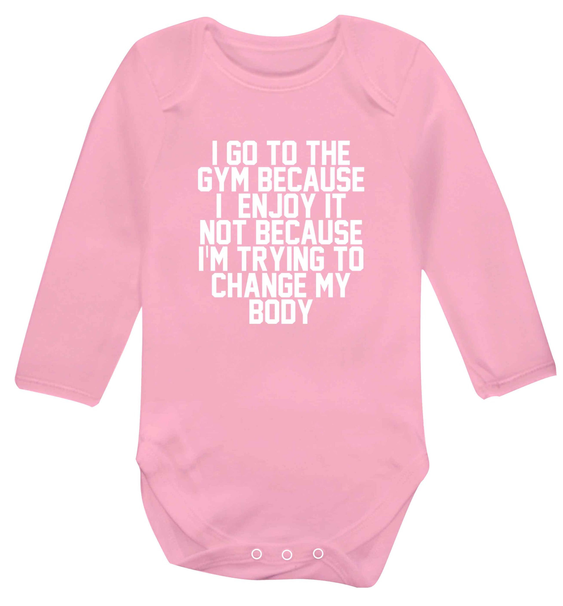 I go to the gym because I enjoy it not because I'm trying to change my body baby vest long sleeved pale pink 6-12 months