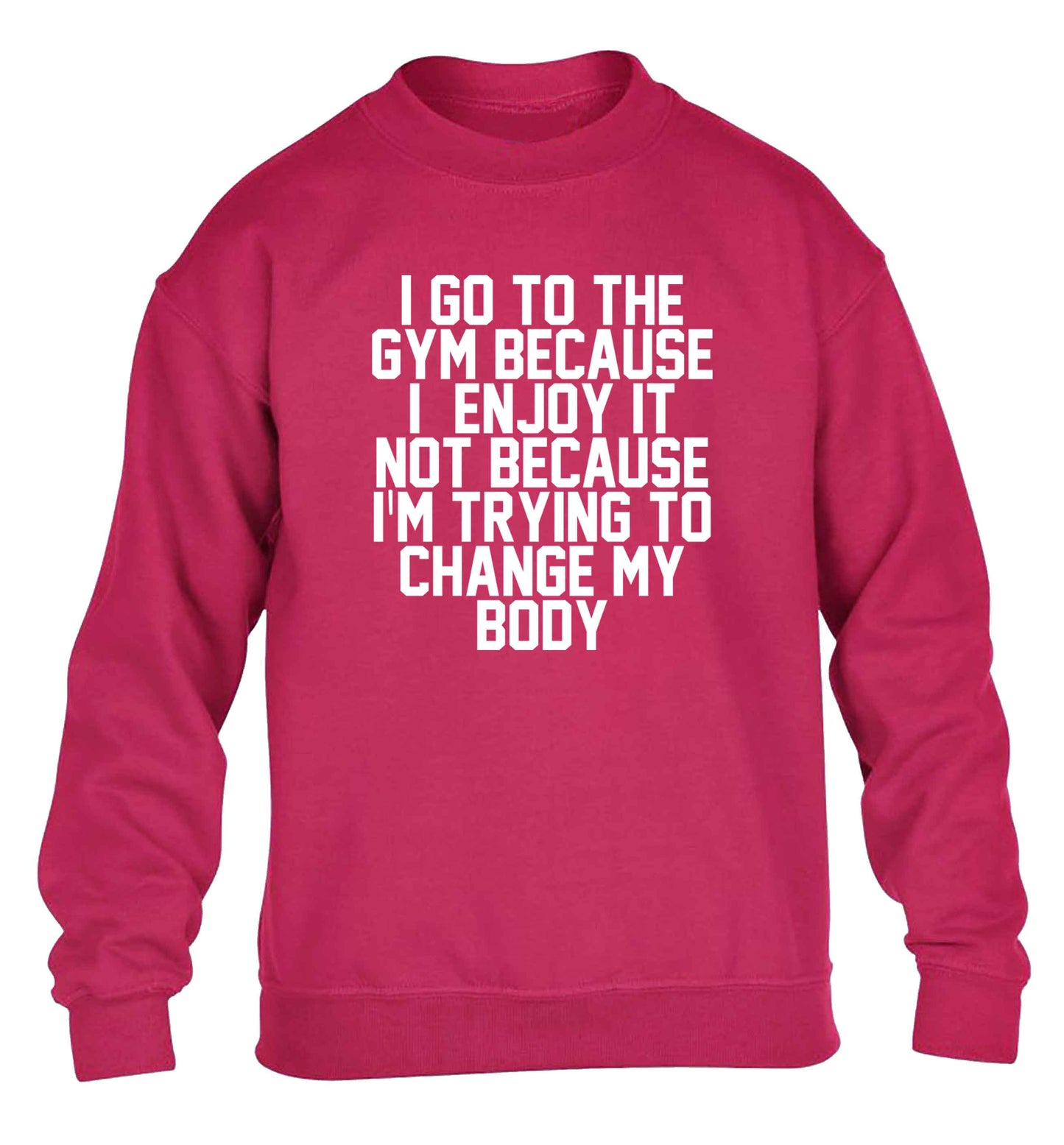 I go to the gym because I enjoy it not because I'm trying to change my body children's pink sweater 12-13 Years