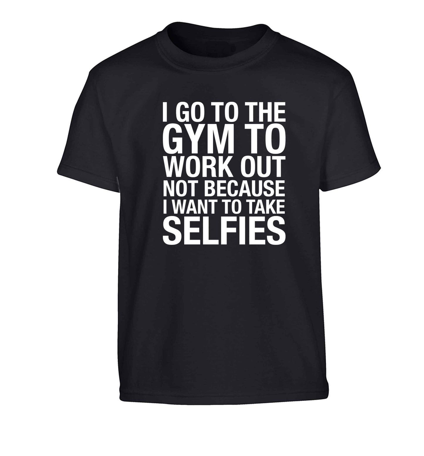 I go to the gym to workout not to take selfies Children's black Tshirt 12-13 Years