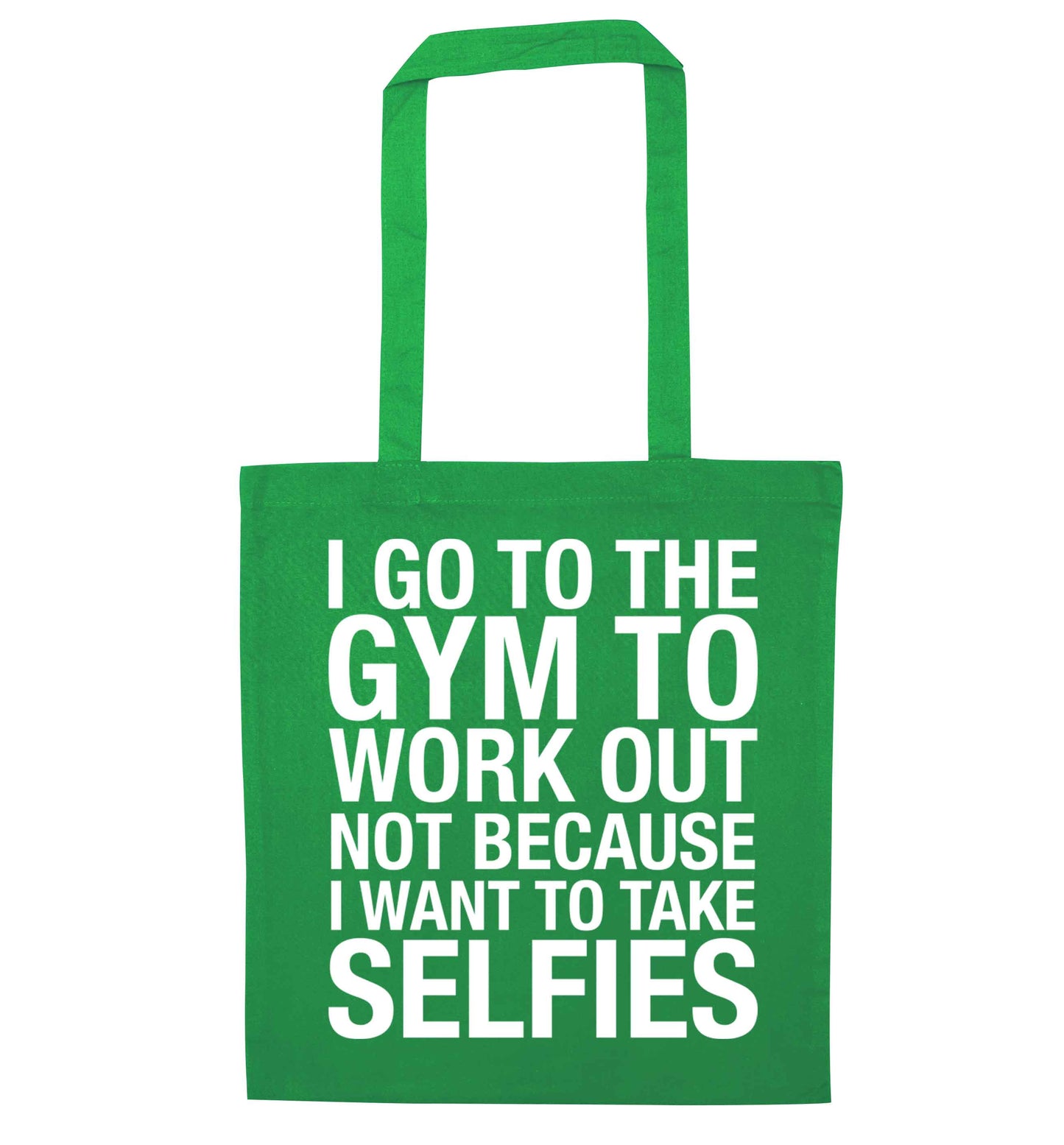 I go to the gym to workout not to take selfies green tote bag