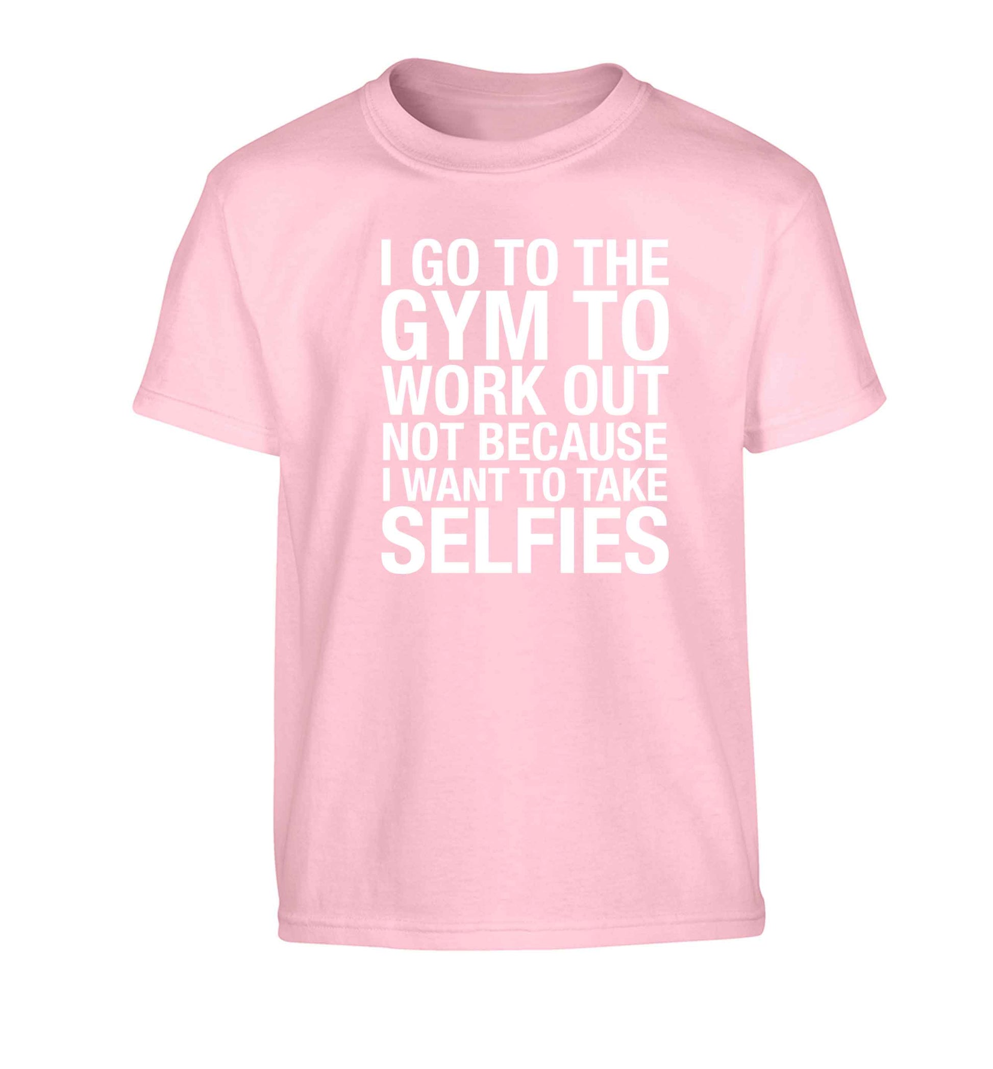 I go to the gym to workout not to take selfies Children's light pink Tshirt 12-13 Years