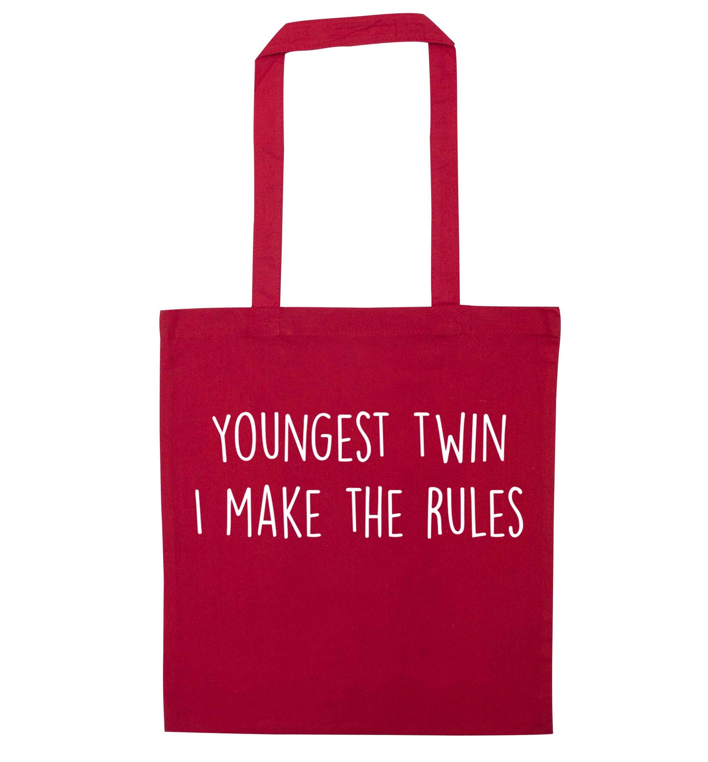 Youngest twin I make the rules red tote bag