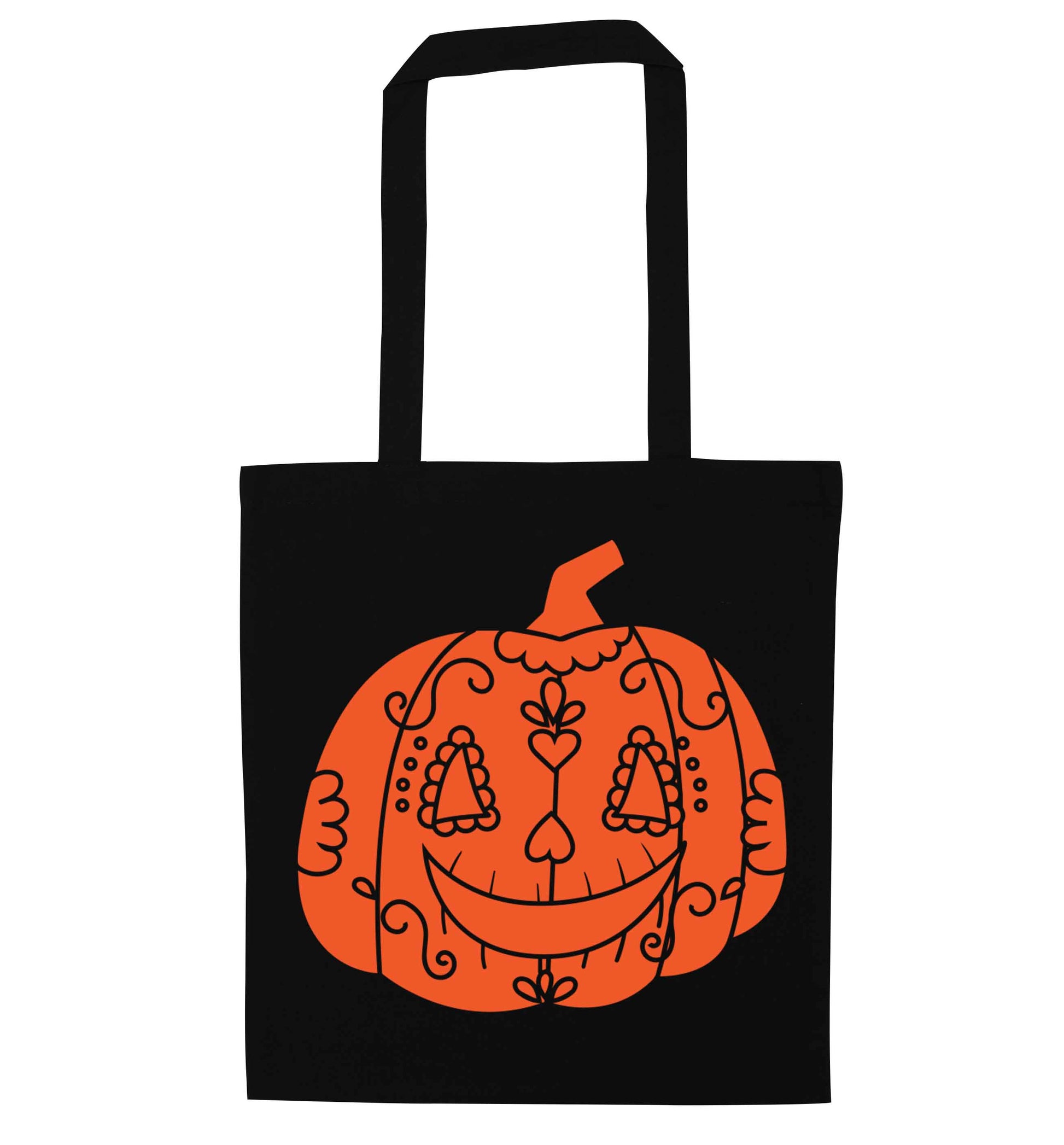 Pumpkin sugar skull black tote bag