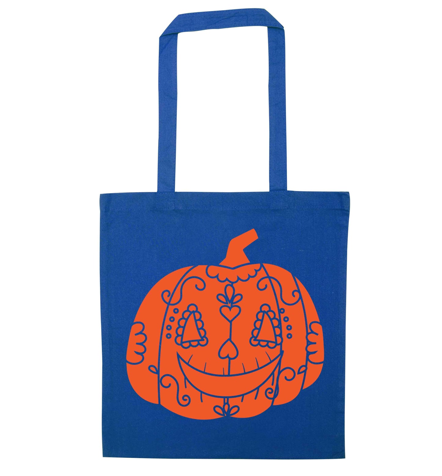 Pumpkin sugar skull blue tote bag