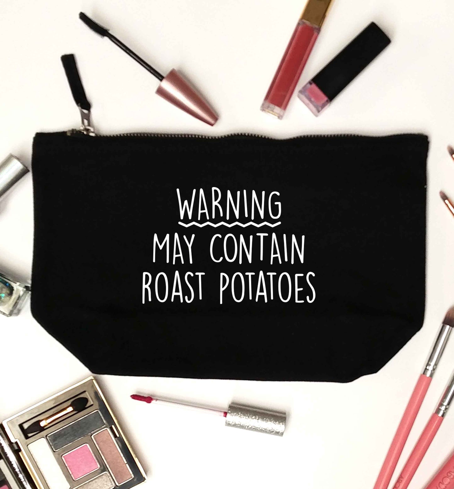 Warning may containg roast potatoes black makeup bag