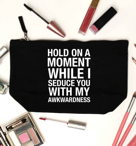 Hold on a moment while I seduce you with my awkwardness black makeup bag