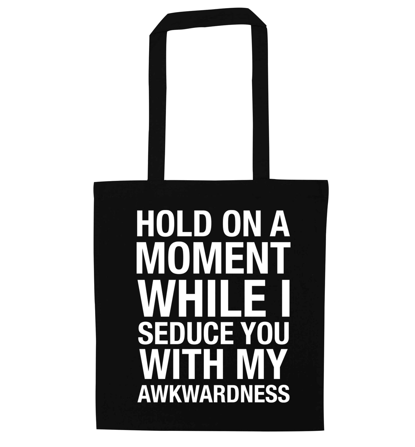 Hold on a moment while I seduce you with my awkwardness black tote bag