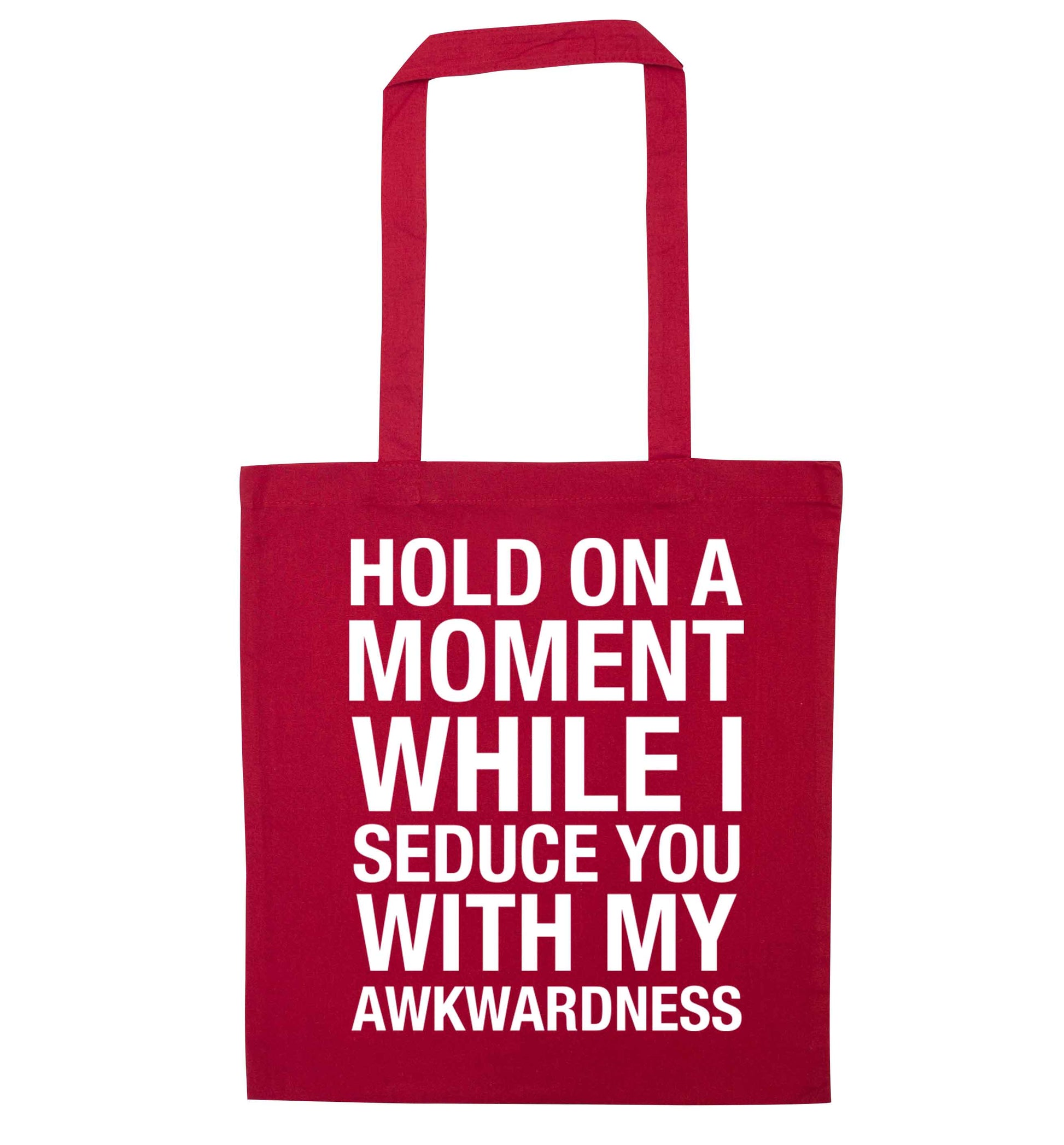 Hold on a moment while I seduce you with my awkwardness red tote bag