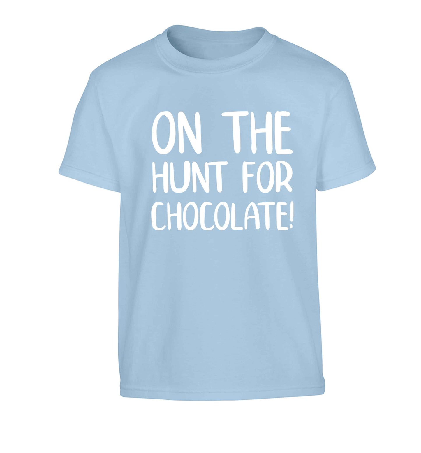 On the hunt for chocolate! Children's light blue Tshirt 12-13 Years