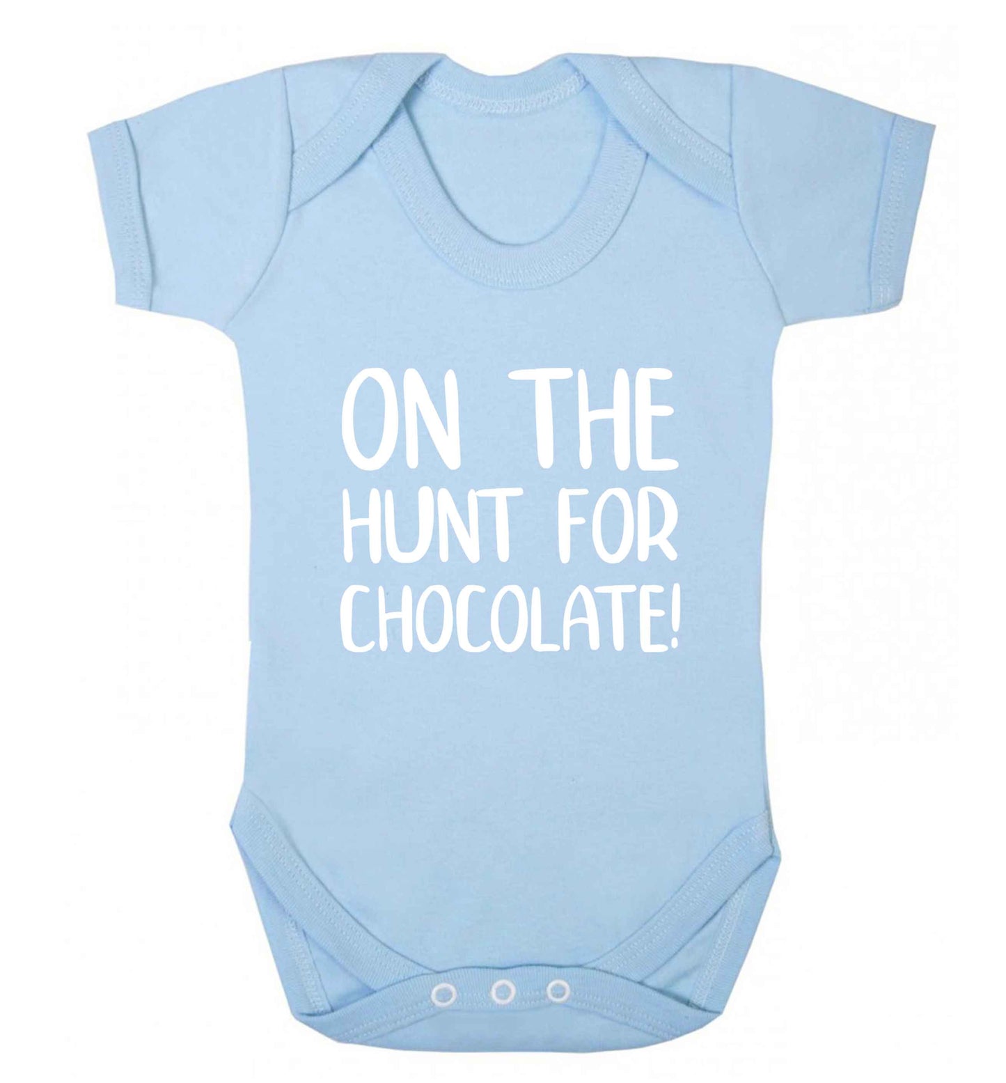 On the hunt for chocolate! baby vest pale blue 18-24 months