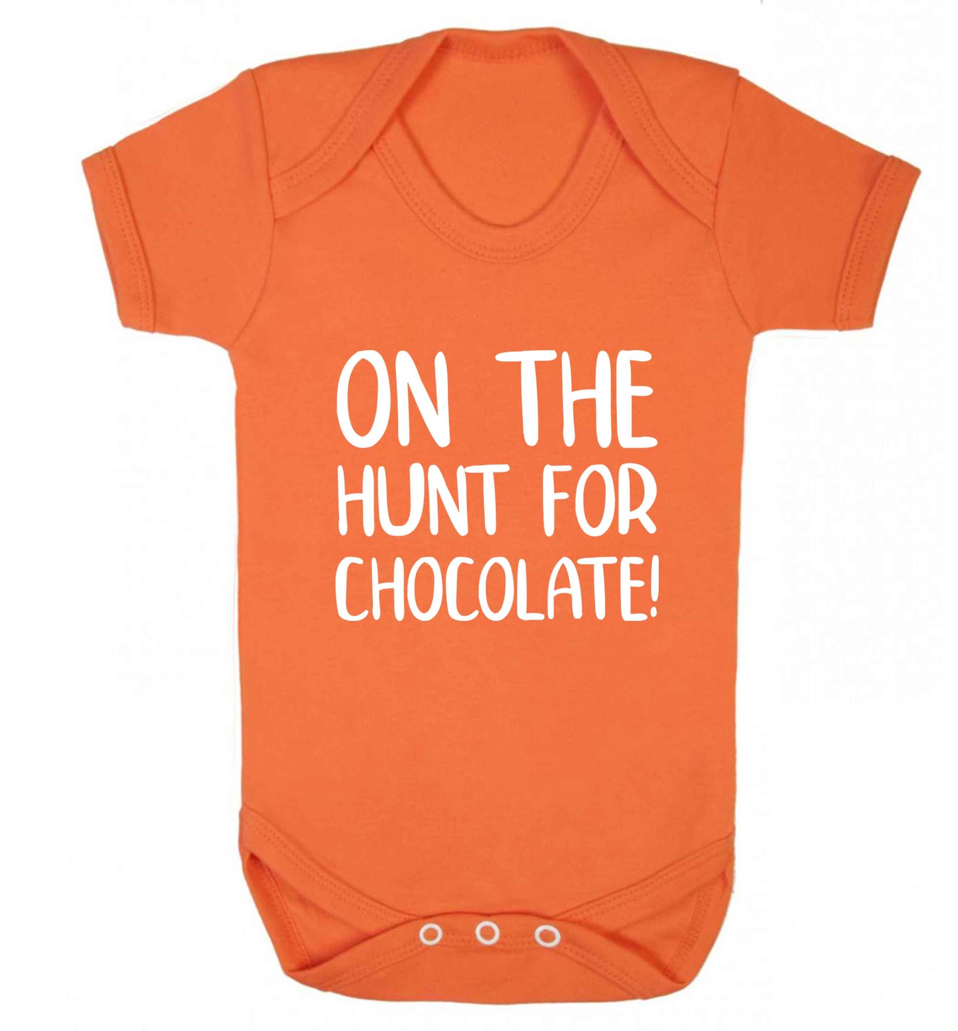 On the hunt for chocolate! baby vest orange 18-24 months