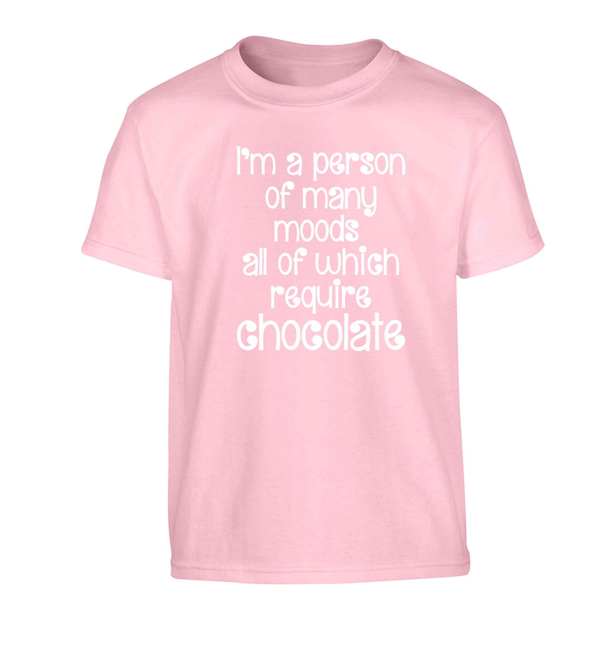 funny gift for a chocaholic! I'm a person of many moods all of which require chocolate Children's light pink Tshirt 12-13 Years