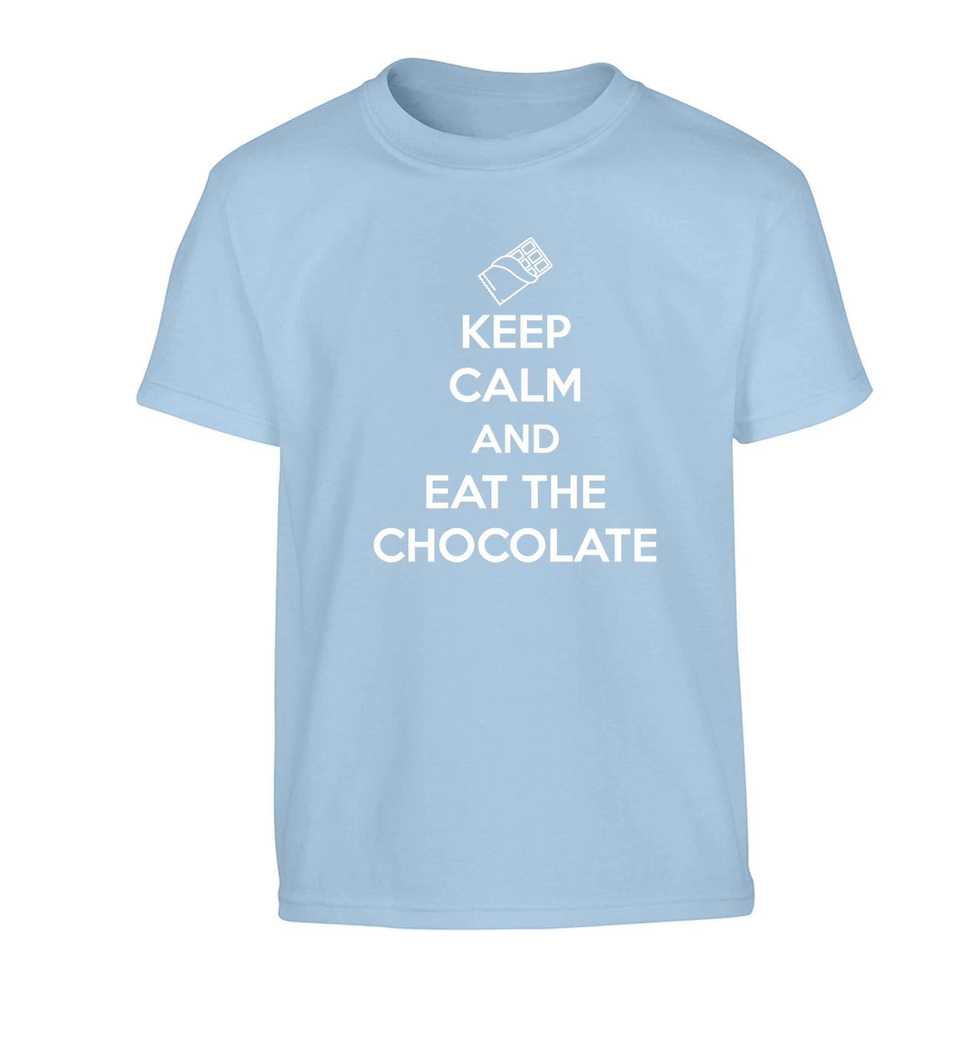 funny gift for a chocaholic! Keep calm and eat the chocolate Children's light blue Tshirt 12-13 Years