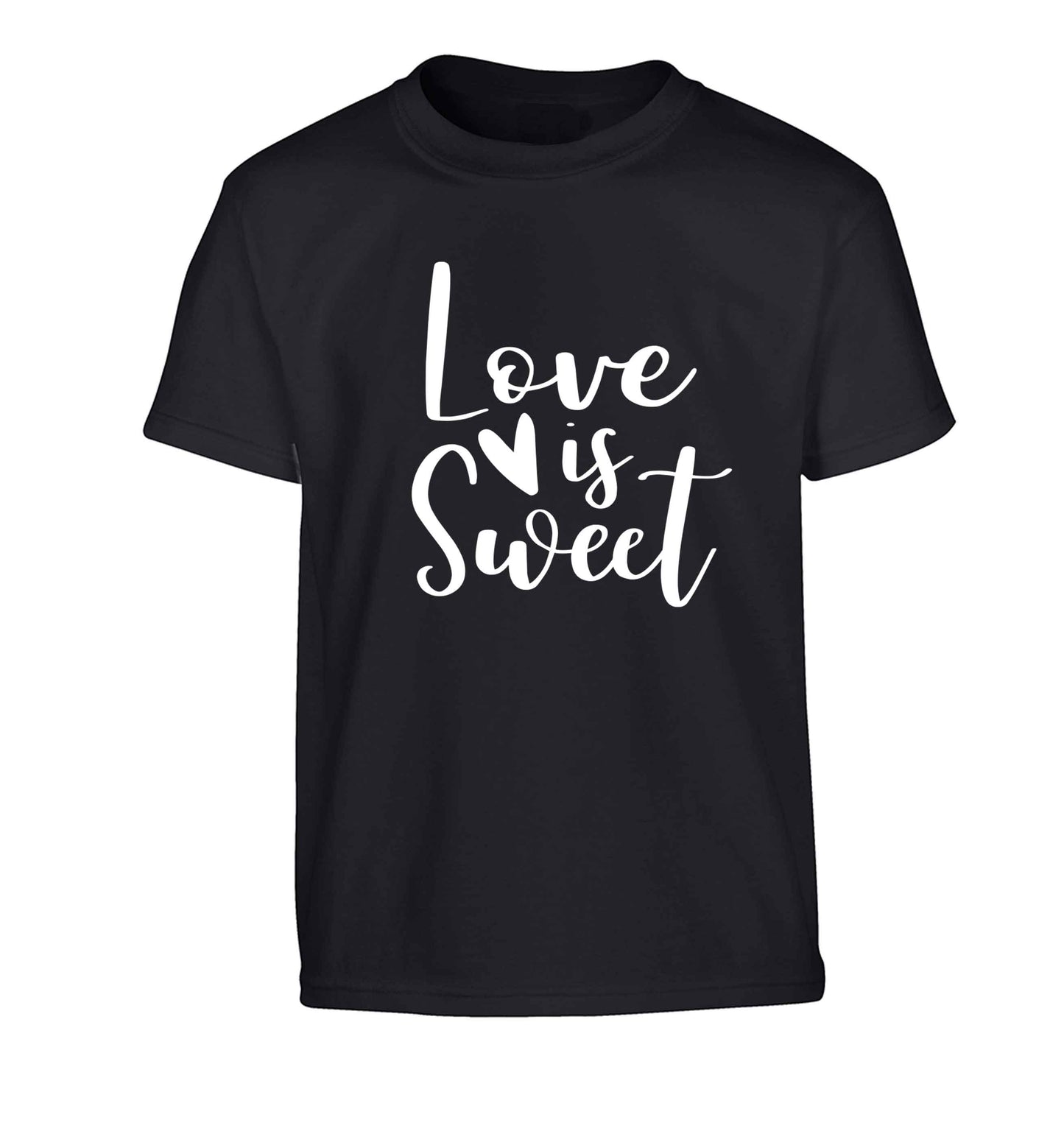 Love really does make the world go round! Ideal for weddings, valentines or just simply to show someone you love them!  Children's black Tshirt 12-13 Years