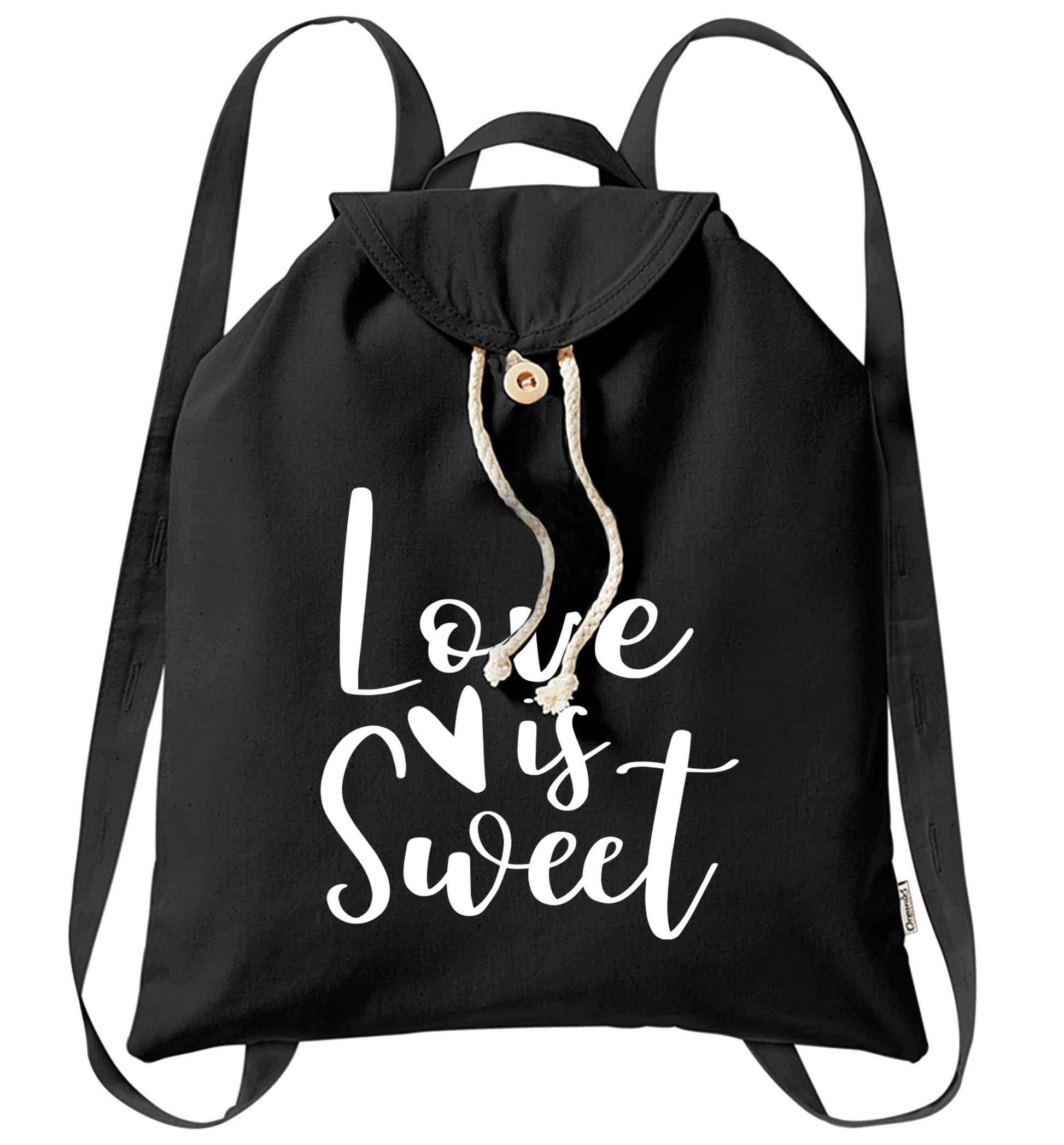 Love really does make the world go round! Ideal for weddings, valentines or just simply to show someone you love them!  organic cotton backpack tote with wooden buttons in black