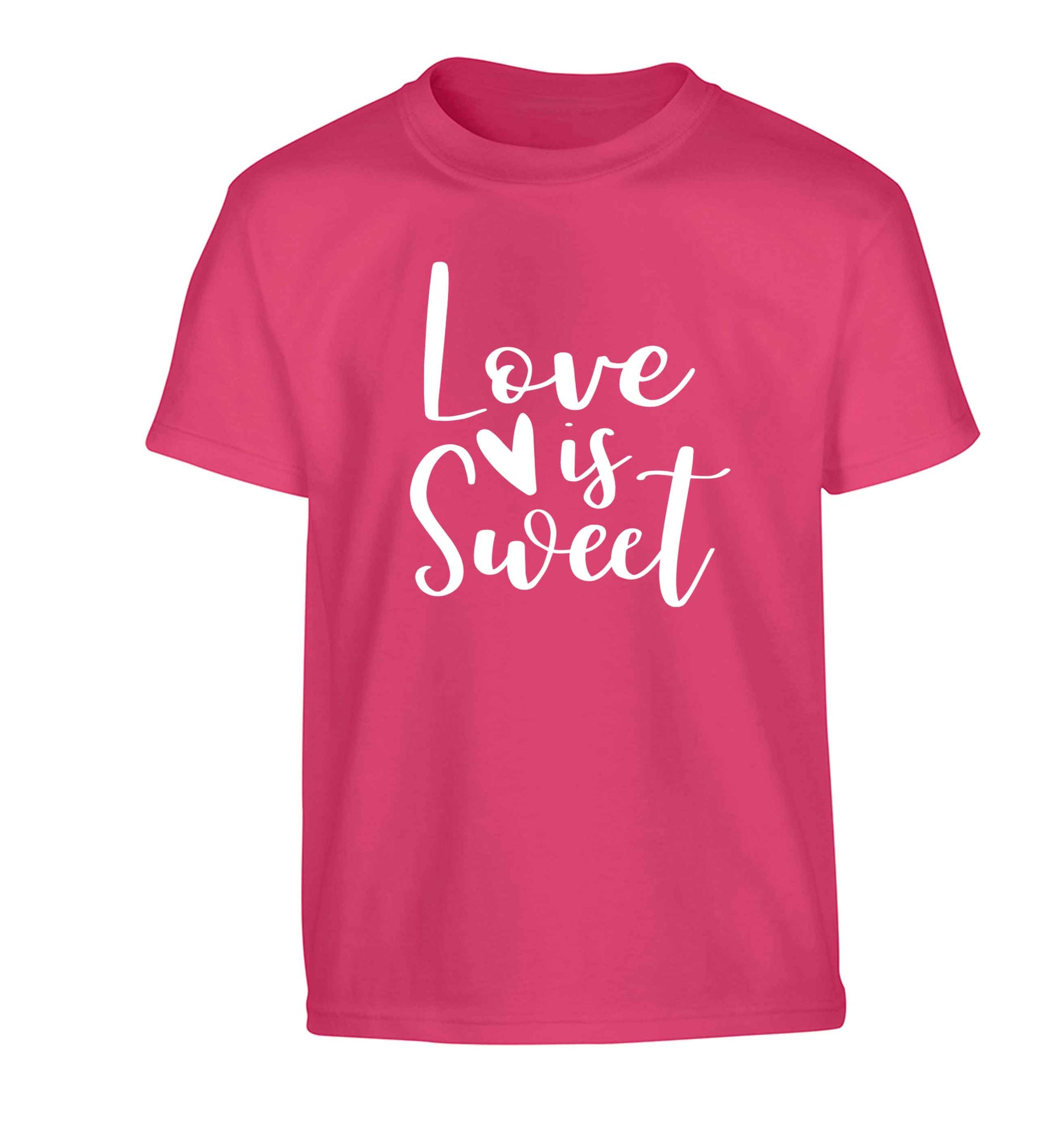 Love really does make the world go round! Ideal for weddings, valentines or just simply to show someone you love them!  Children's pink Tshirt 12-13 Years