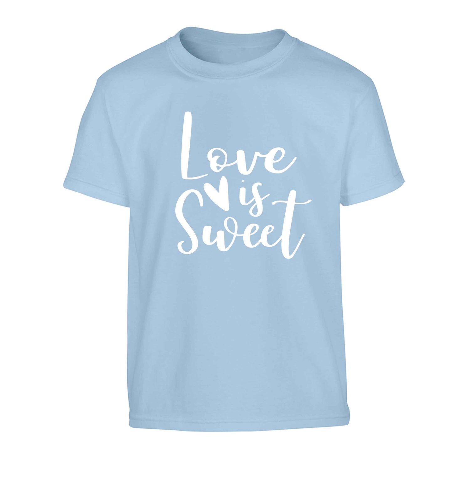 Love really does make the world go round! Ideal for weddings, valentines or just simply to show someone you love them!  Children's light blue Tshirt 12-13 Years