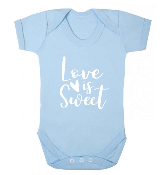 Love really does make the world go round! Ideal for weddings, valentines or just simply to show someone you love them!  baby vest pale blue 18-24 months