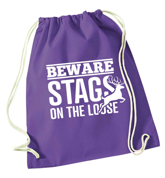 Beware stags on the loose purple drawstring bag