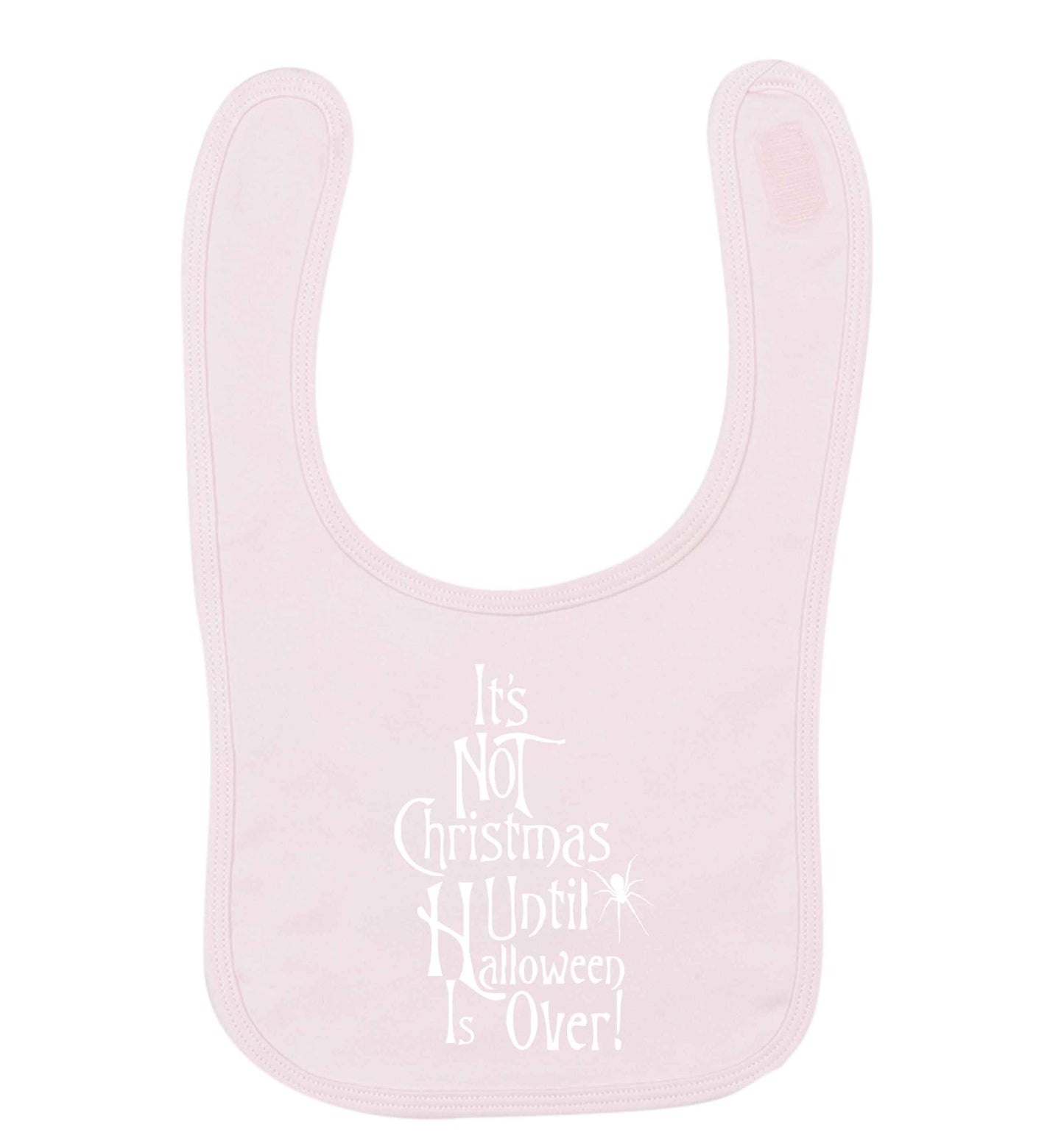 It's not Christmas until Halloween is over pale pink baby bib