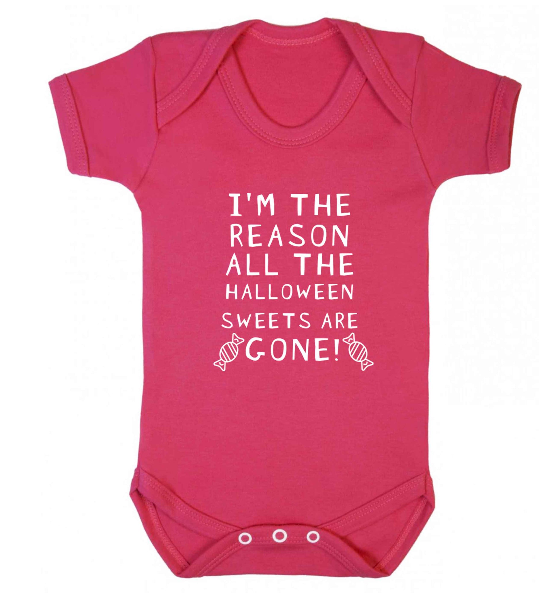 I'm the reason all of the halloween sweets are gone baby vest dark pink 18-24 months