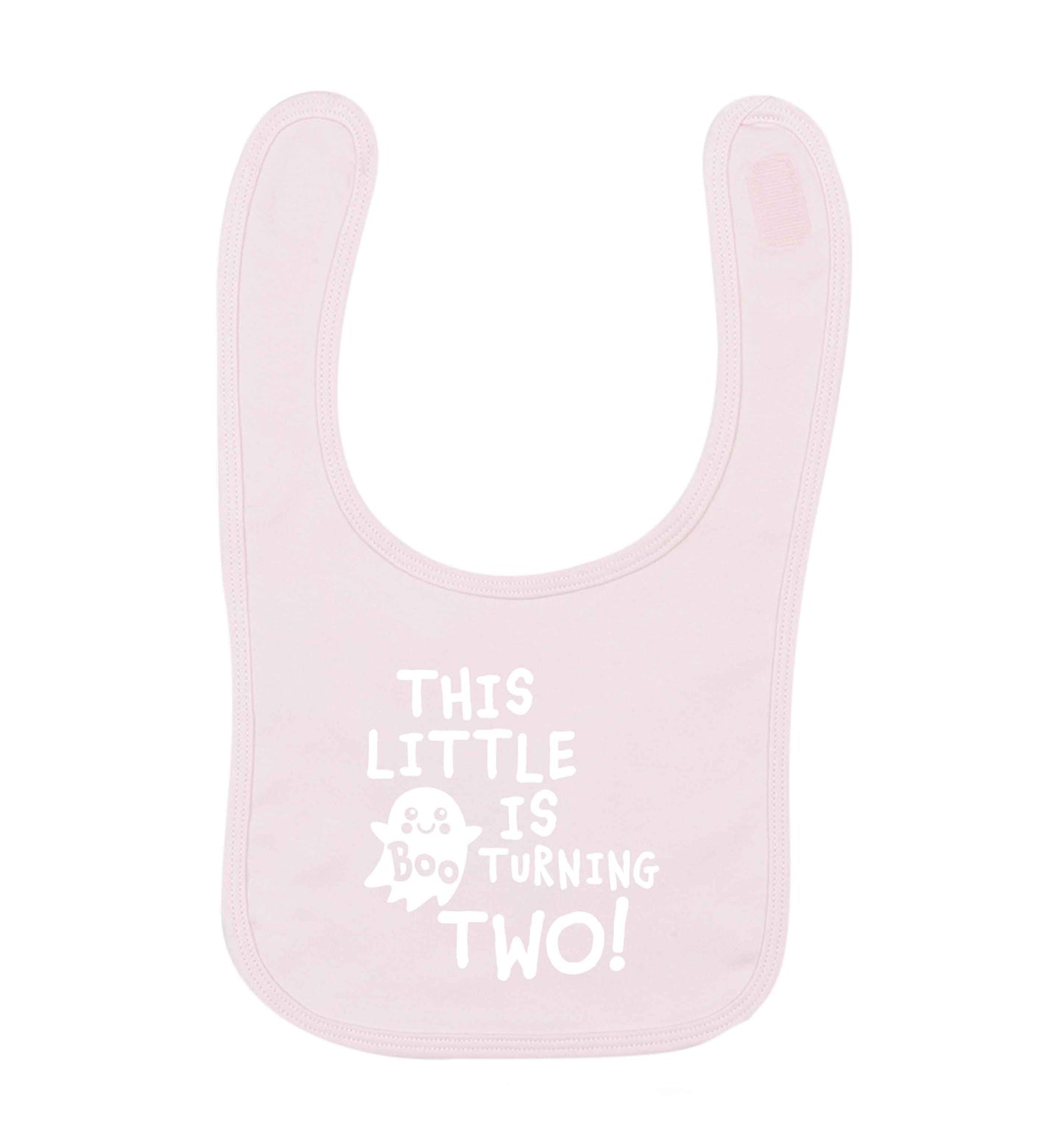 This little boo is turning two pale pink baby bib