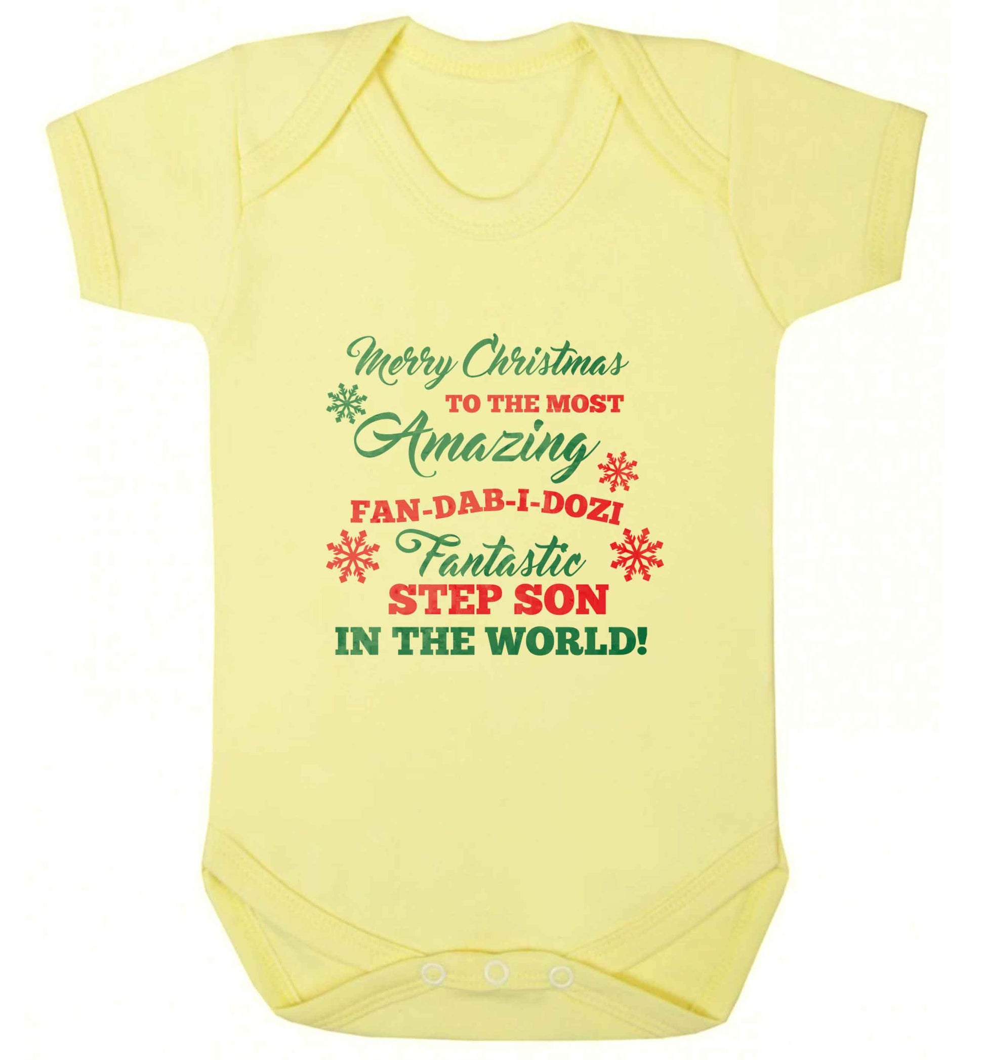 Merry Christmas to the most amazing fan-dab-i-dozi fantasic Step Son in the world baby vest pale yellow 18-24 months
