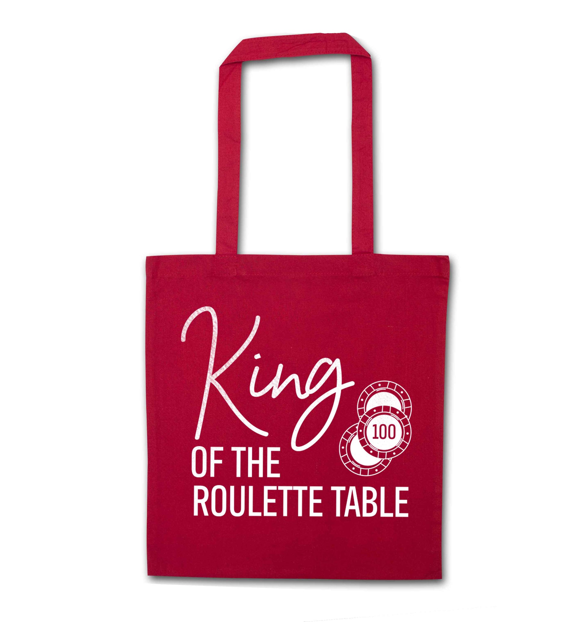 King of the roulette table red tote bag