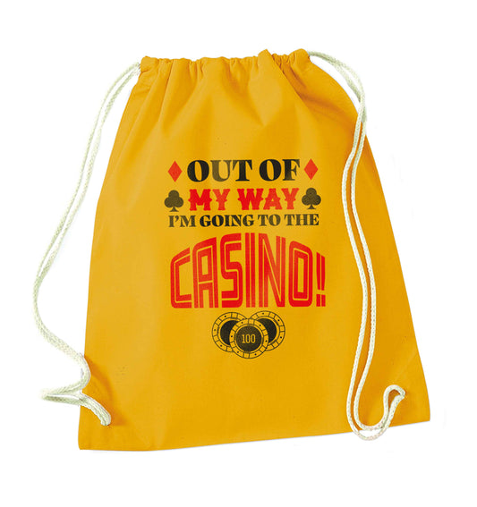 Out of my way I'm going to the casino mustard drawstring bag
