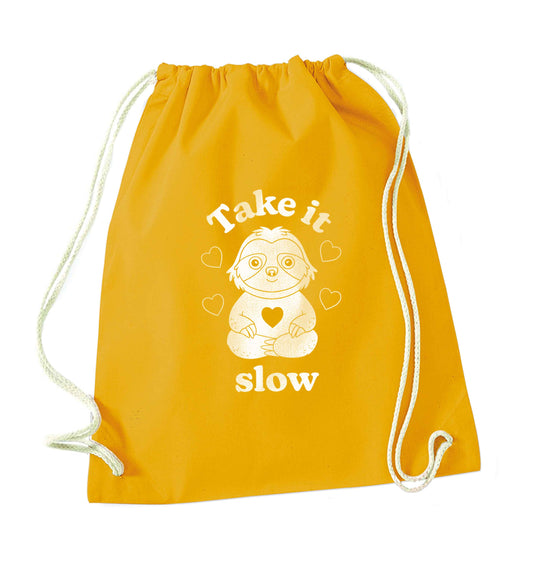 Take it slow mustard drawstring bag