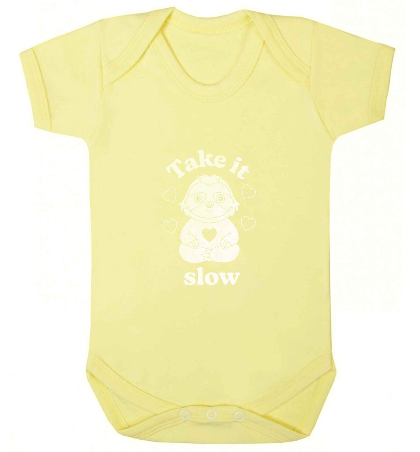 Take it slow baby vest pale yellow 18-24 months