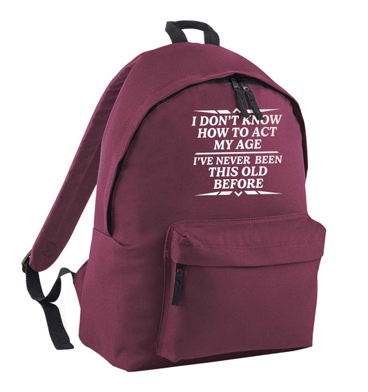 I don't know how to act my age I've never been this old before maroon children's backpack