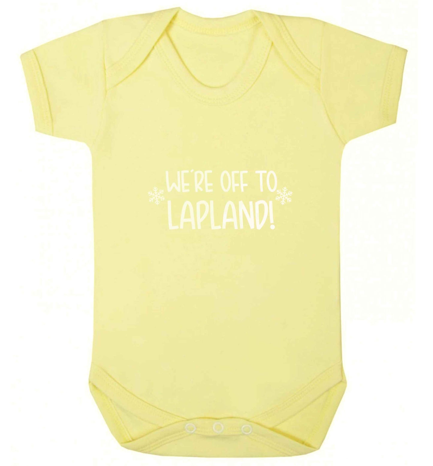 We're off to Lapland baby vest pale yellow 18-24 months