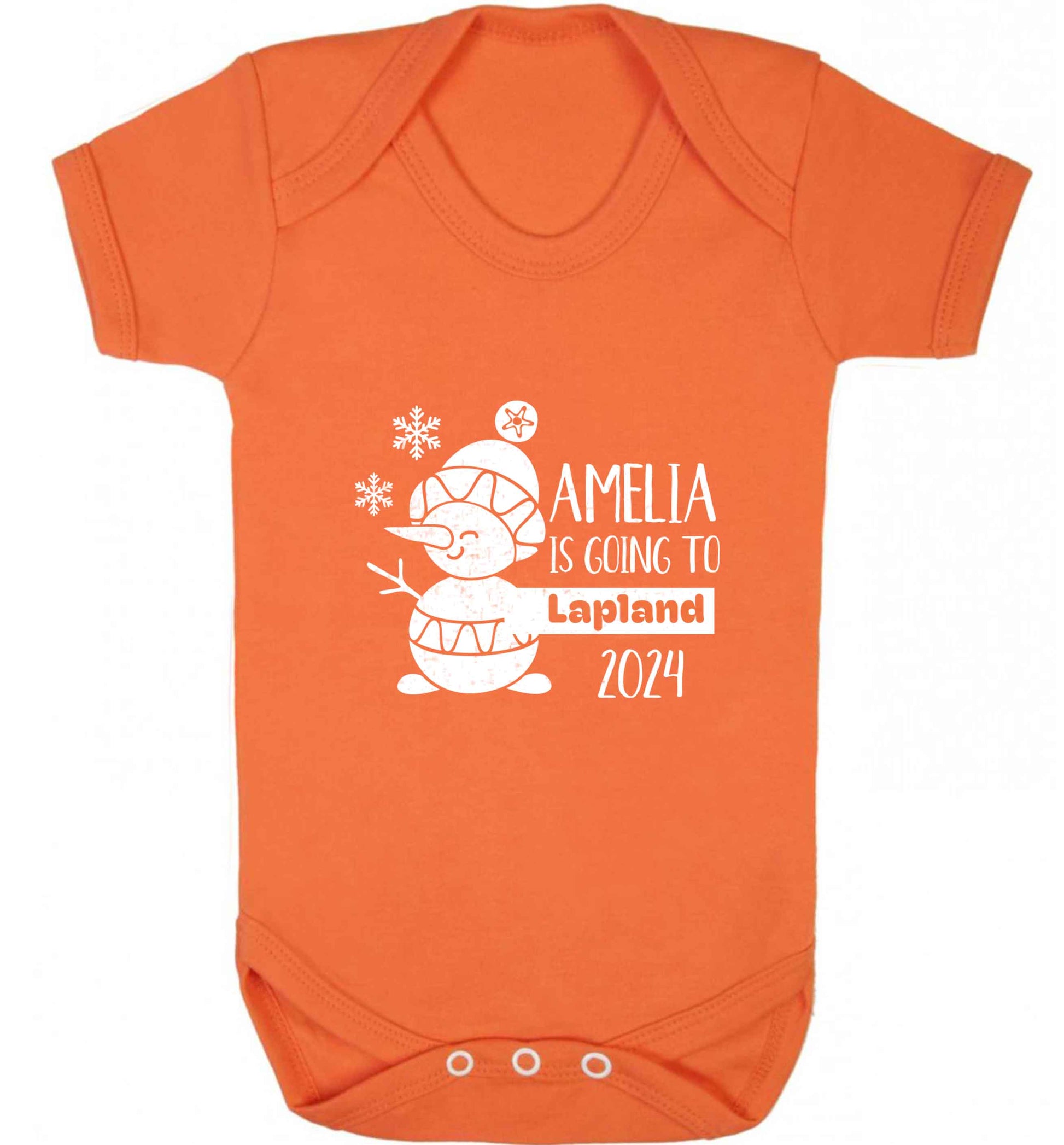 Any name here - is going to Lapland personalised baby vest orange 18-24 months