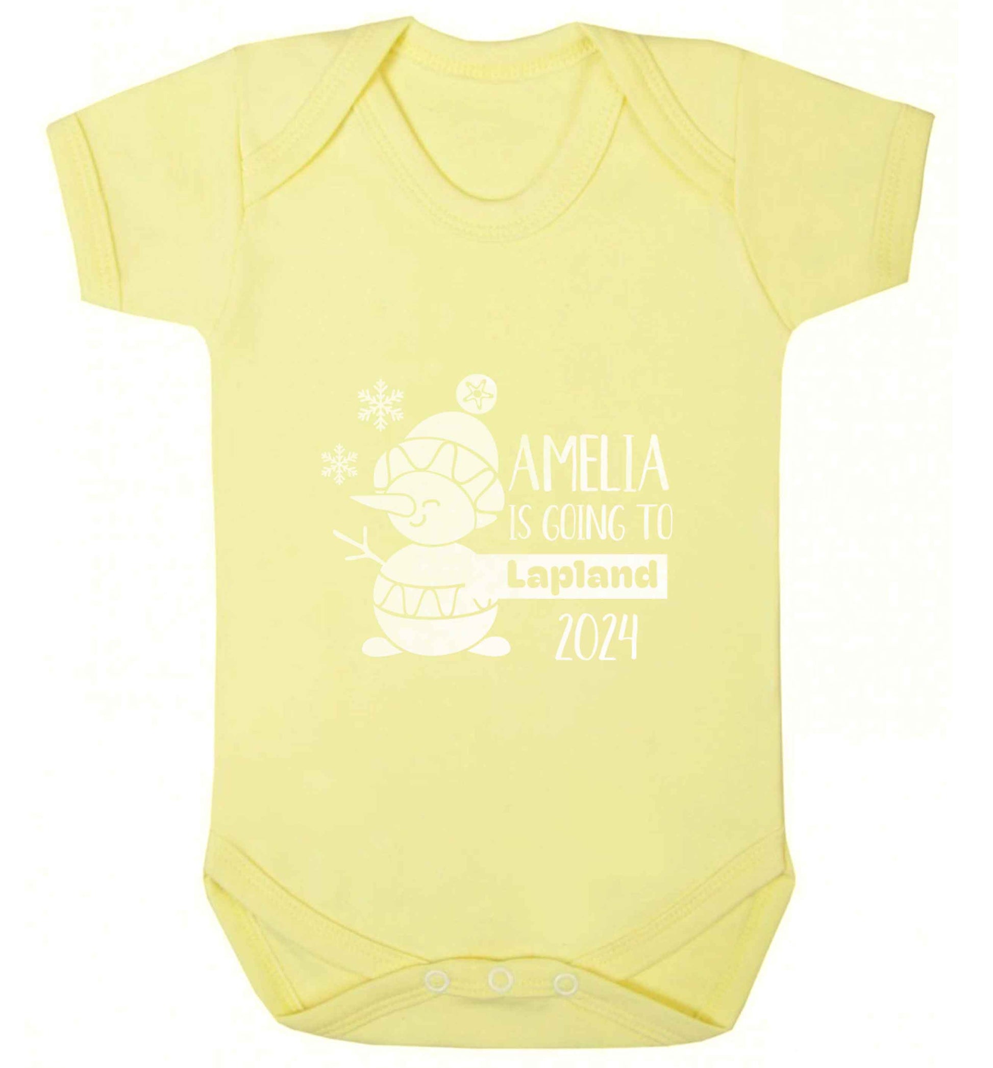 Any name here - is going to Lapland personalised baby vest pale yellow 18-24 months