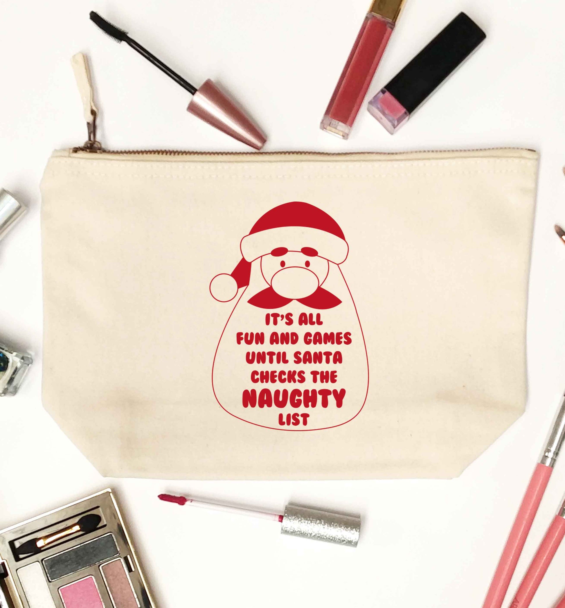 It's all fun and games until Santa checks the naughty list natural makeup bag