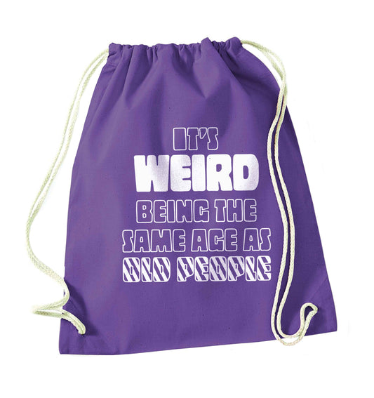 It's weird being the same age as old people purple drawstring bag