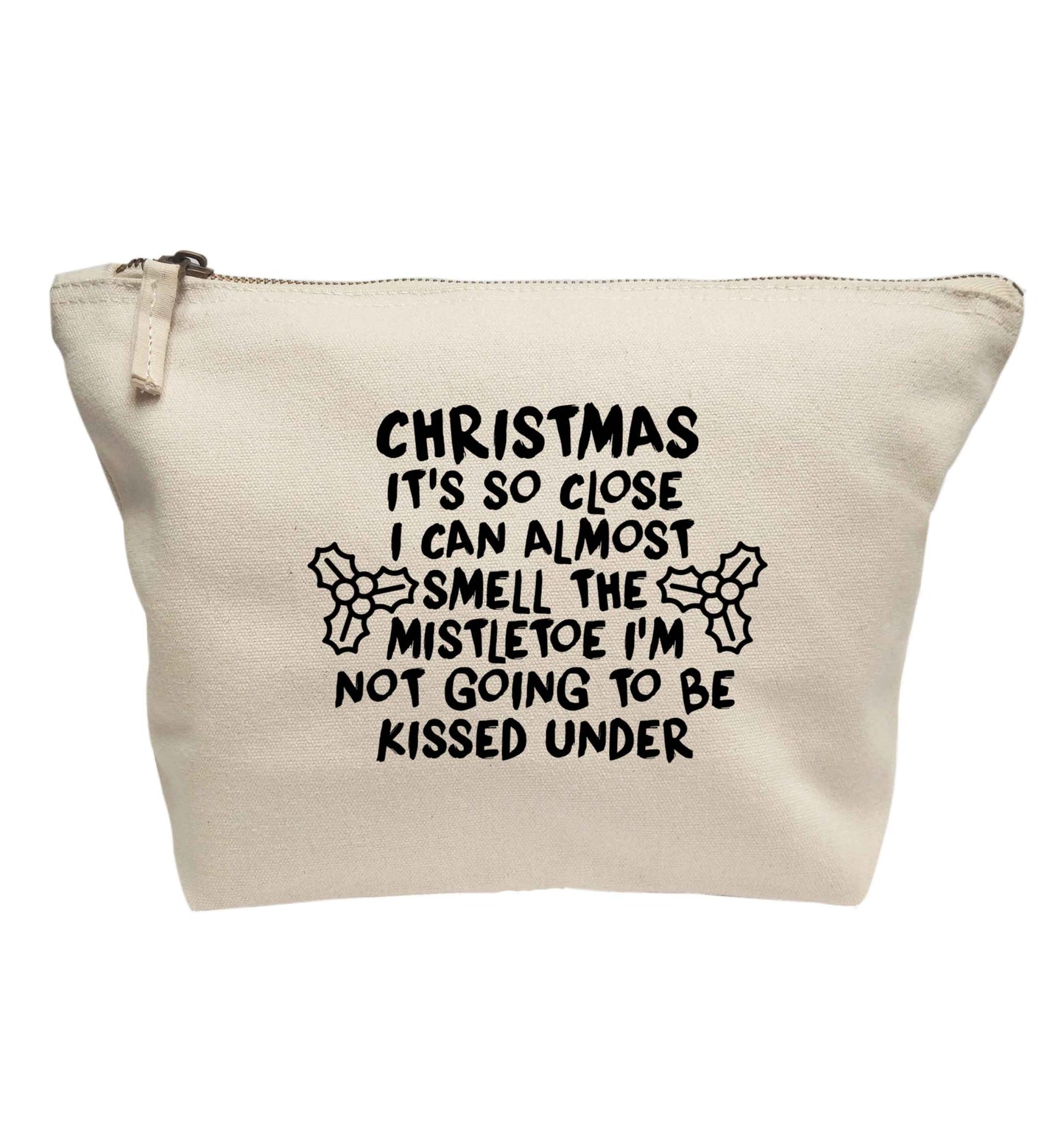 Christmas it's so close I can almost smell the misteltoe I'm not going to be kissed under | Makeup / wash bag