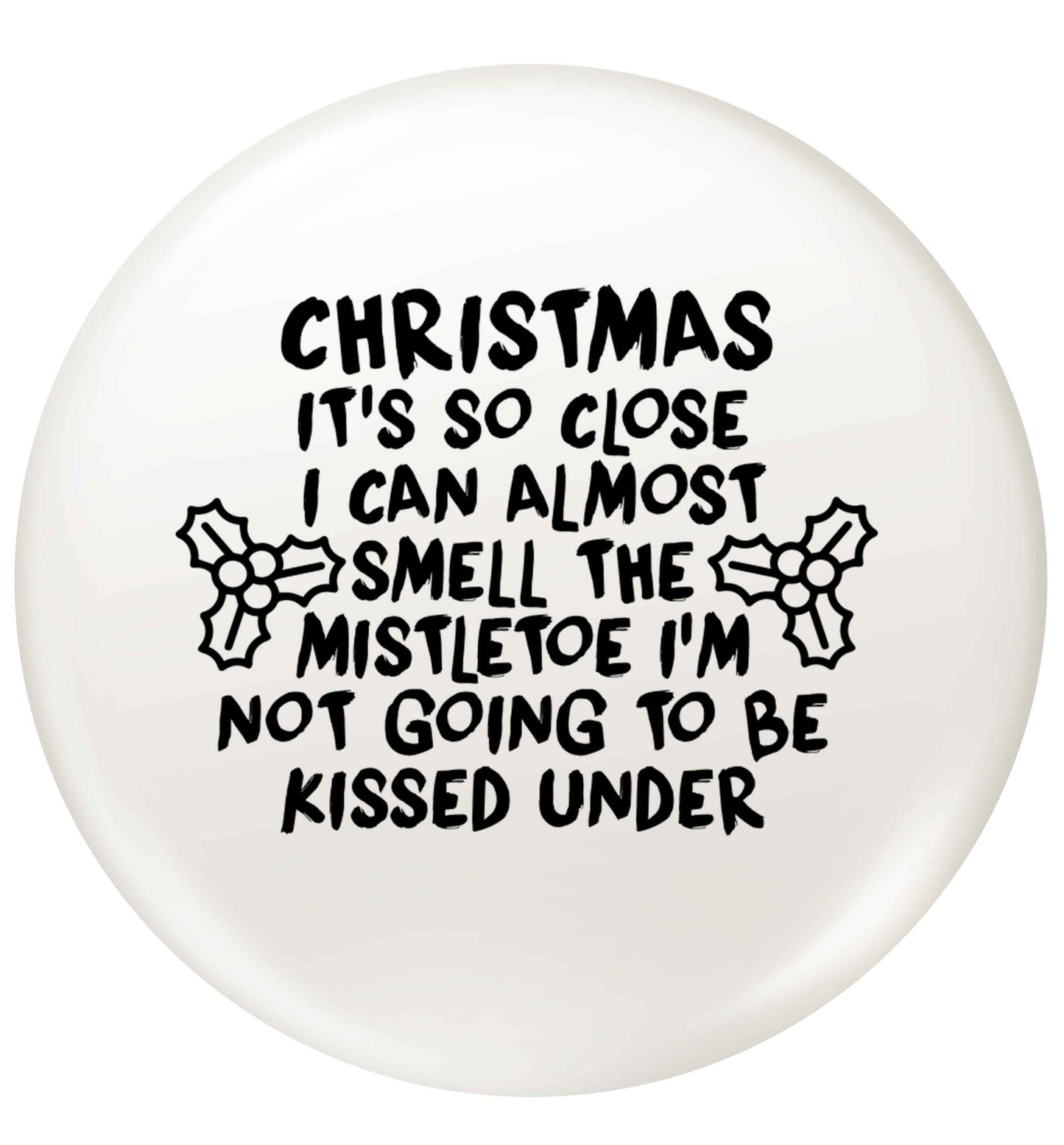 Christmas it's so close I can almost smell the misteltoe I'm not going to be kissed under small 25mm Pin badge