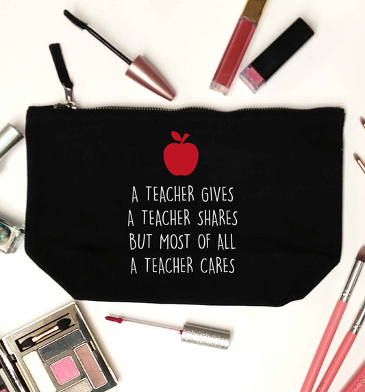 A teacher gives a teacher shares but most of all a teacher cares black makeup bag
