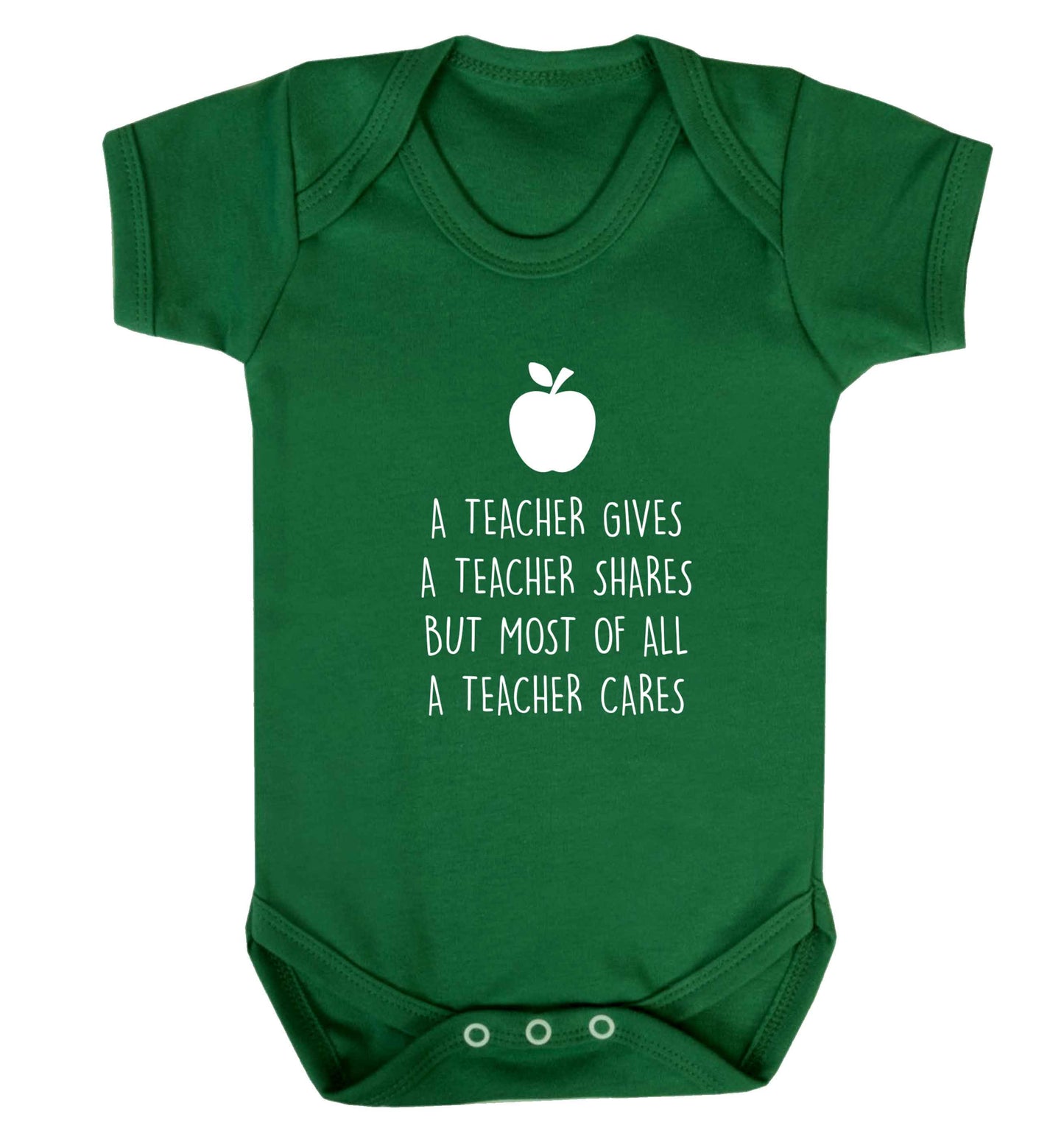 A teacher gives a teacher shares but most of all a teacher cares baby vest green 18-24 months