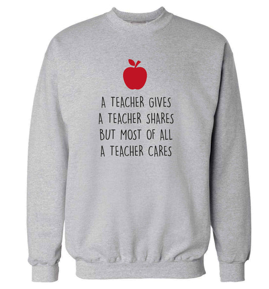 A teacher gives a teacher shares but most of all a teacher cares adult's unisex grey sweater 2XL
