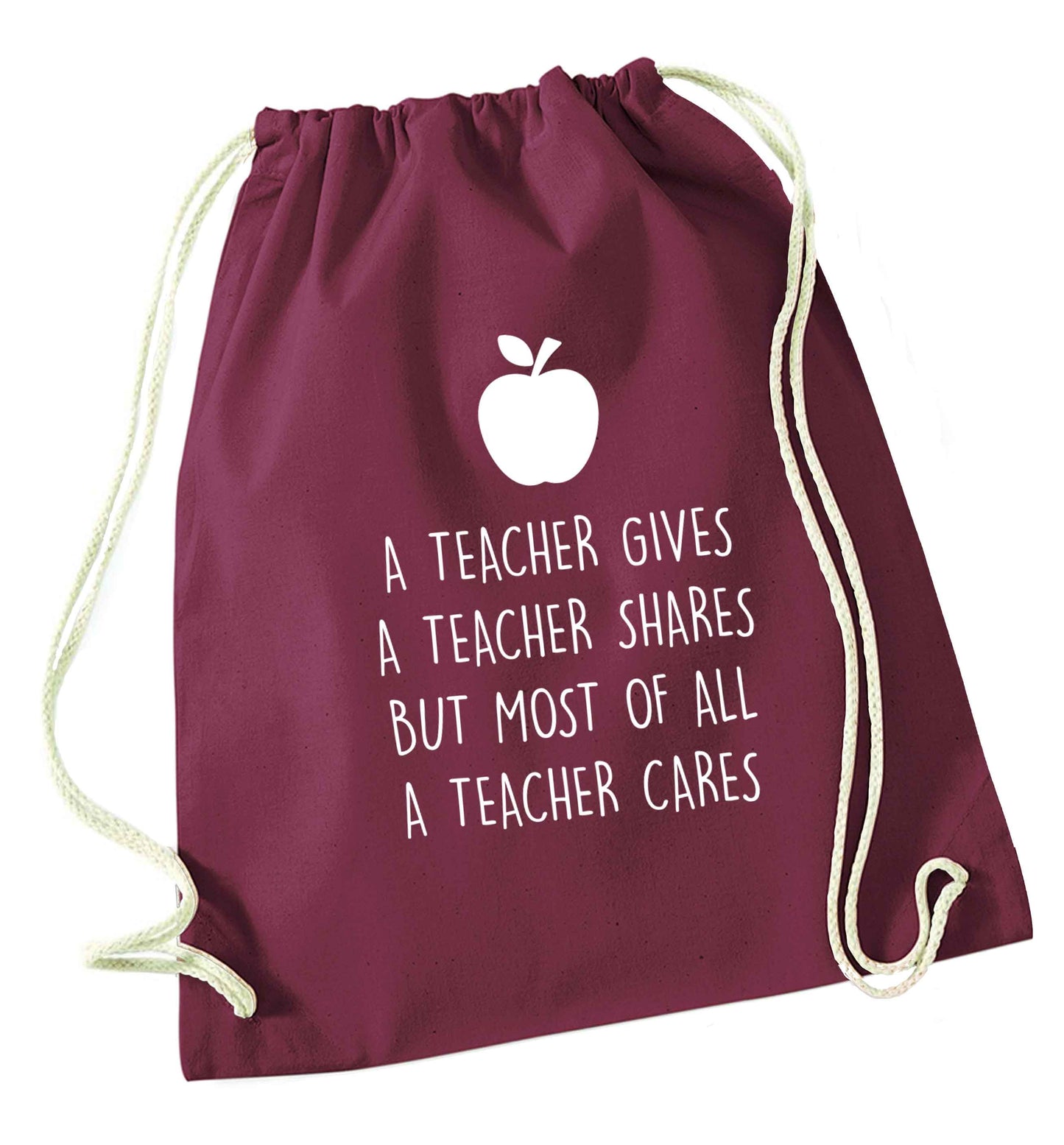 A teacher gives a teacher shares but most of all a teacher cares maroon drawstring bag