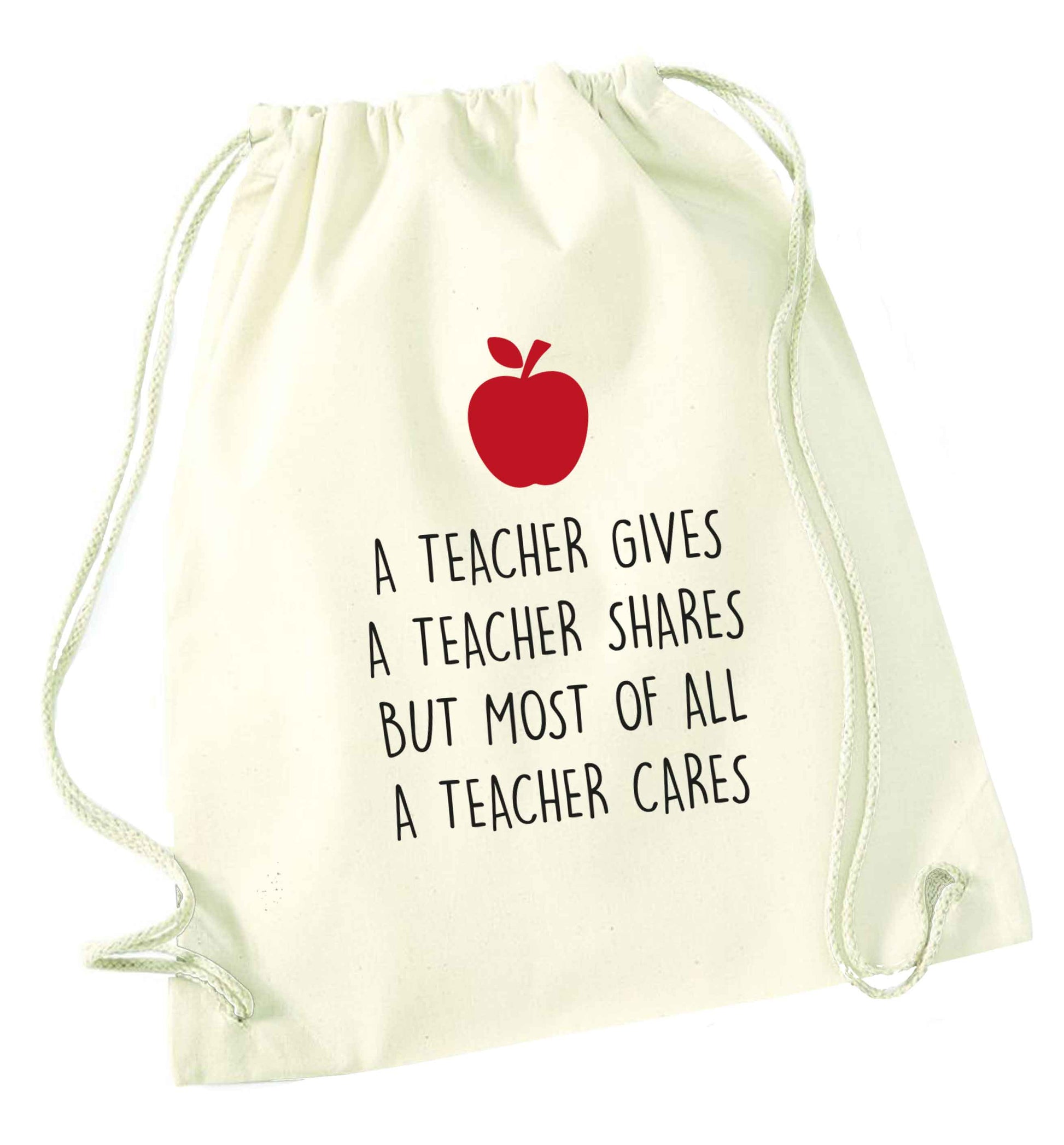 A teacher gives a teacher shares but most of all a teacher cares natural drawstring bag